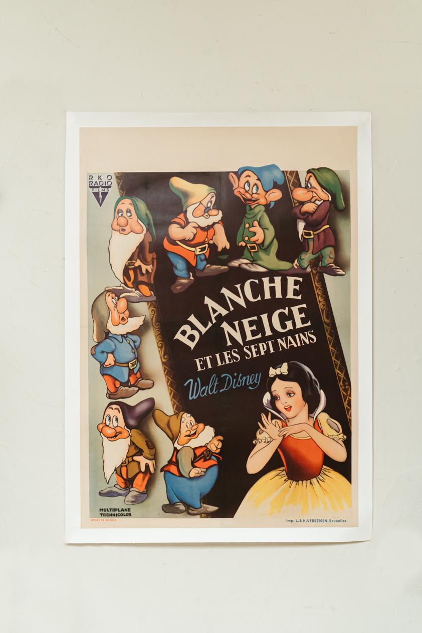 This movie poster is the Belgian version of the worldwide release of Snowwhite by Walt Disney in 1938. printed by Imprimerie L & H Verstegen, Brussels.
Typical for this poster is the size, larger than normal. Material for the collector.