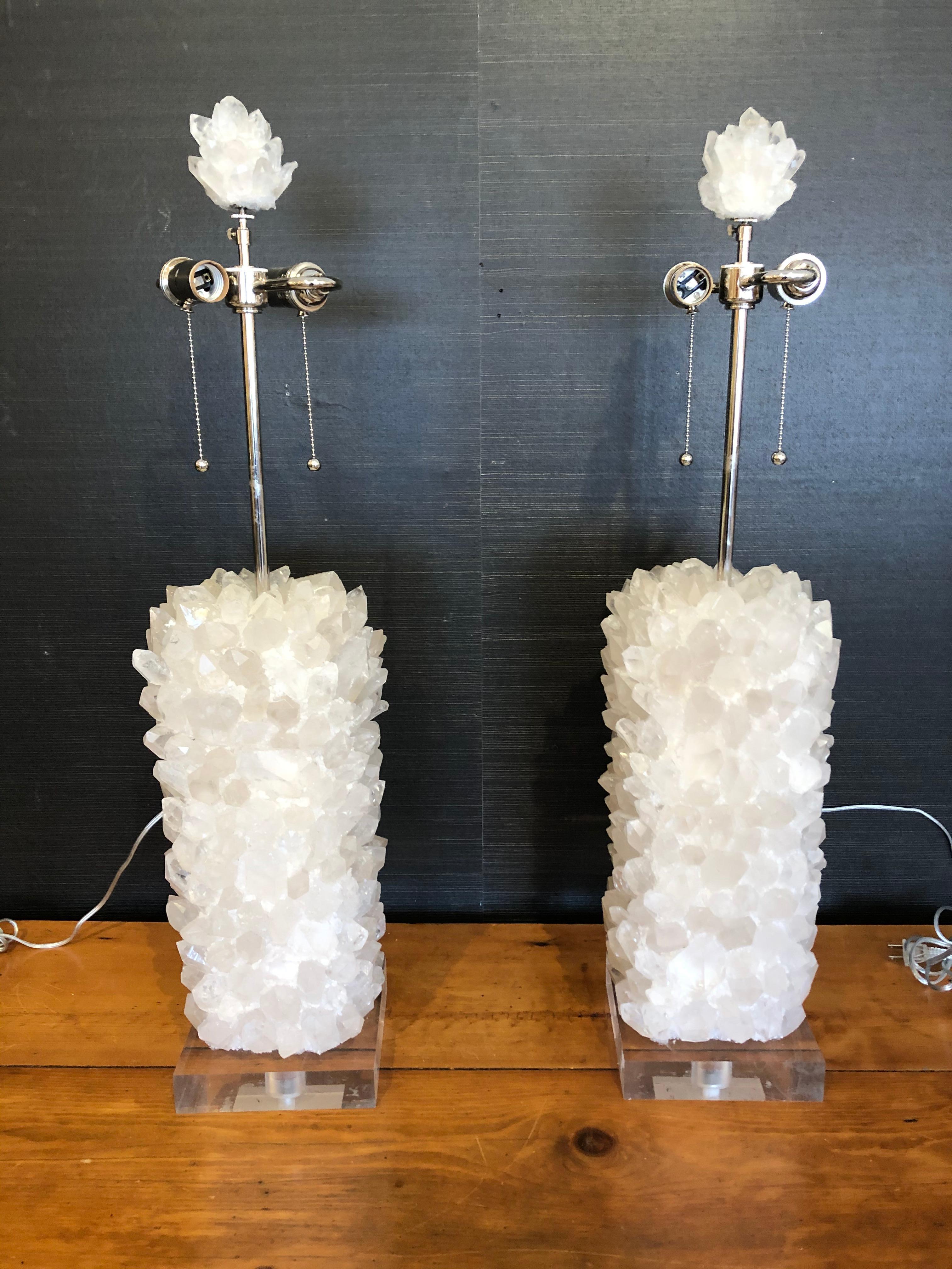 Sensational big gutsy glamorous custom made table lamp having sculptural rock crystal column that reminds us of mouthwatering rock candy, having Lucite base, custom pleated shade and scrumptious matching rock crystal finial. 
Base is 7