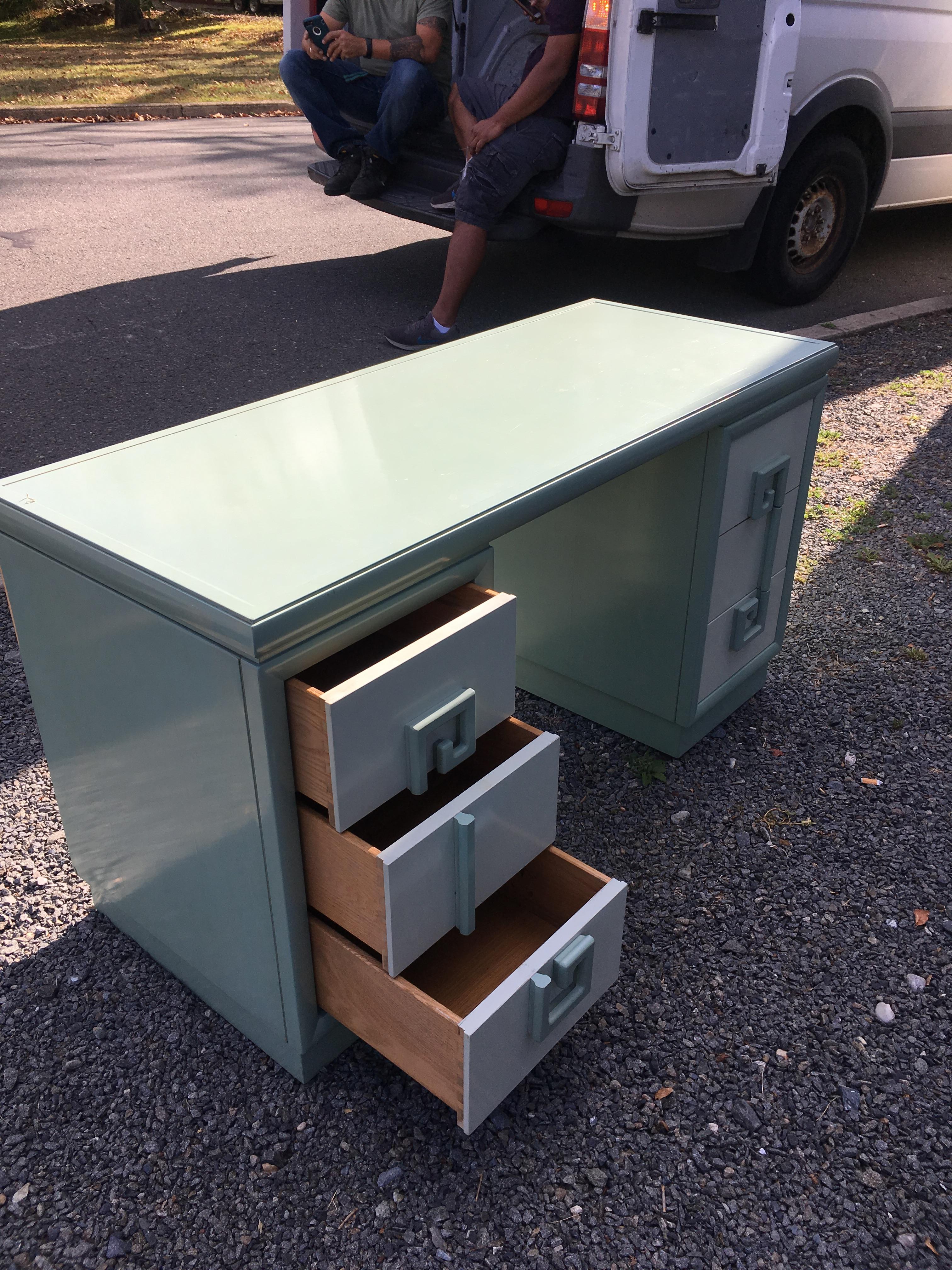 A glamorous painted vanity in Seafoam green and white having stylish Greek key inspired pulls on the 3 stacked drawers right and left. There's a matching stool and mirror also available, price upon request.
Measures: Seat 18 x 19. Mirror 35 1/2 x