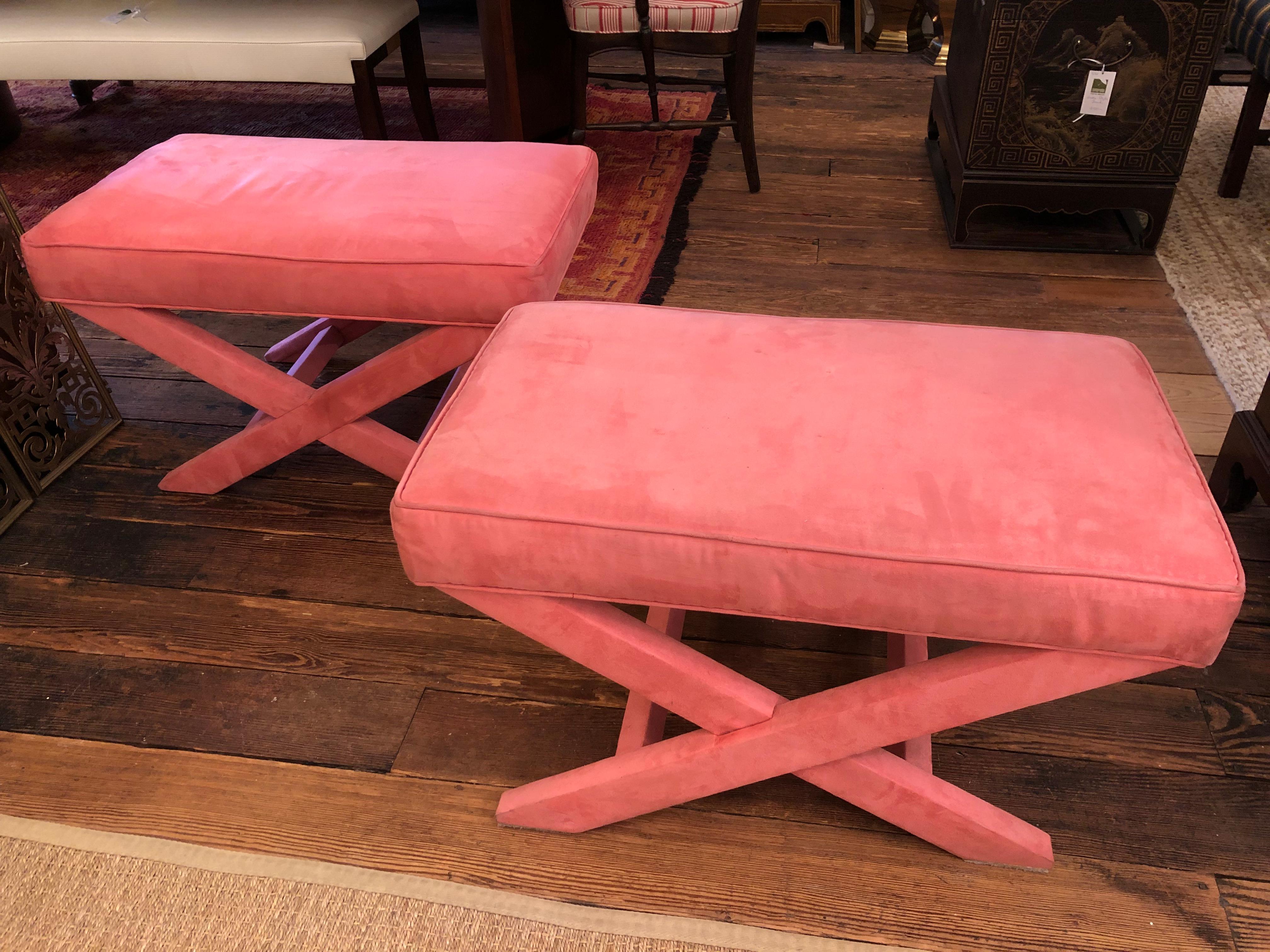 From the estate of NYC socialite Georgette Mosbacher a fetching pair of hot pink ultrasuede benches having mid century modern X base stretchers and rectangular shape. The essence of glamour.