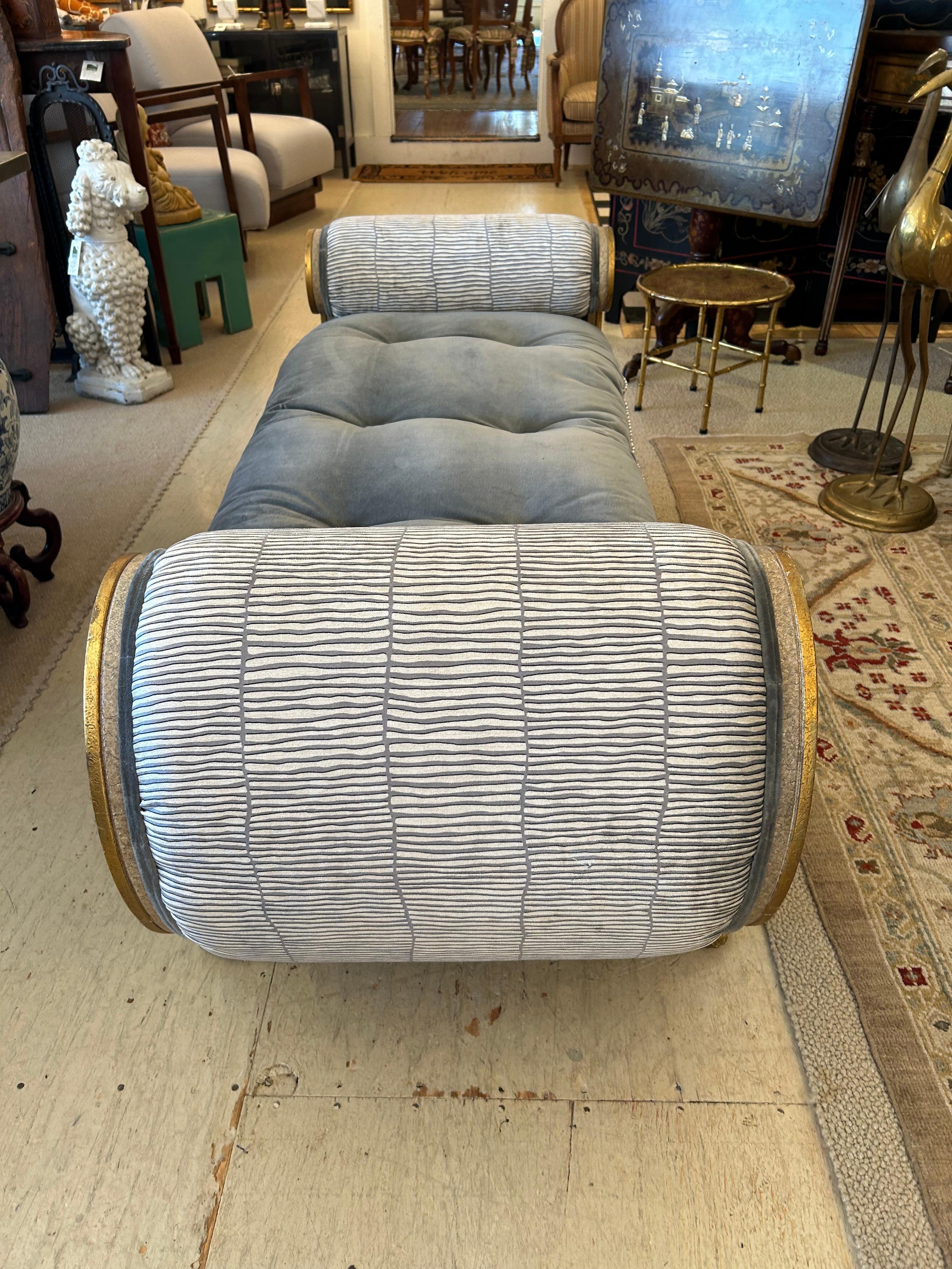 Sublimely sexy small neoclassical chaise longue having marbleized and gilded frame with scroll arms 24.5 h and impressive paw feet.  The upholstery job is super luxurious with removeable tufted velvet gray seat cushion and complimentary velvet cream