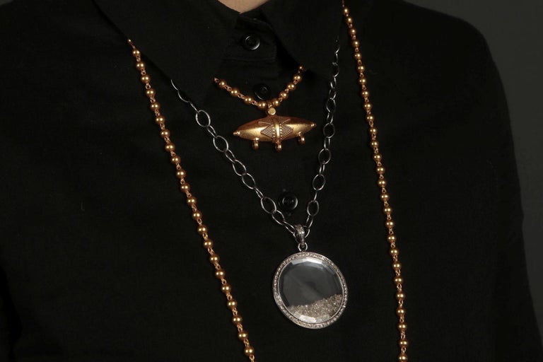 Moving Diamond Charm Pendant at 1stDibs | moving diamond necklace