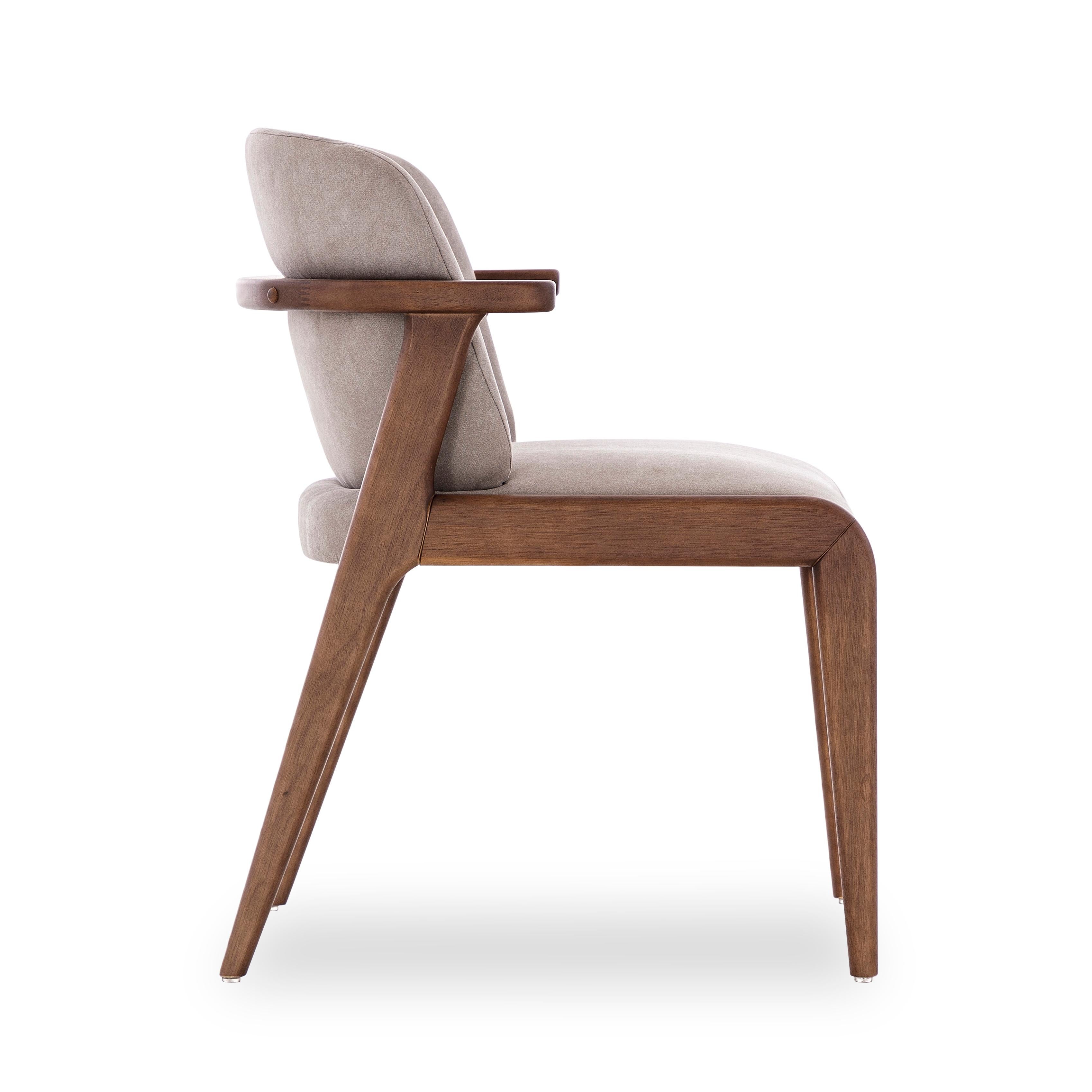 The creative team at Uultis created this dining room chair to embellish that family space with a frame and legs that are made of wood in a walnut finish, combining it with a light brown cotton beautiful fabric. It is a chair designed to provide