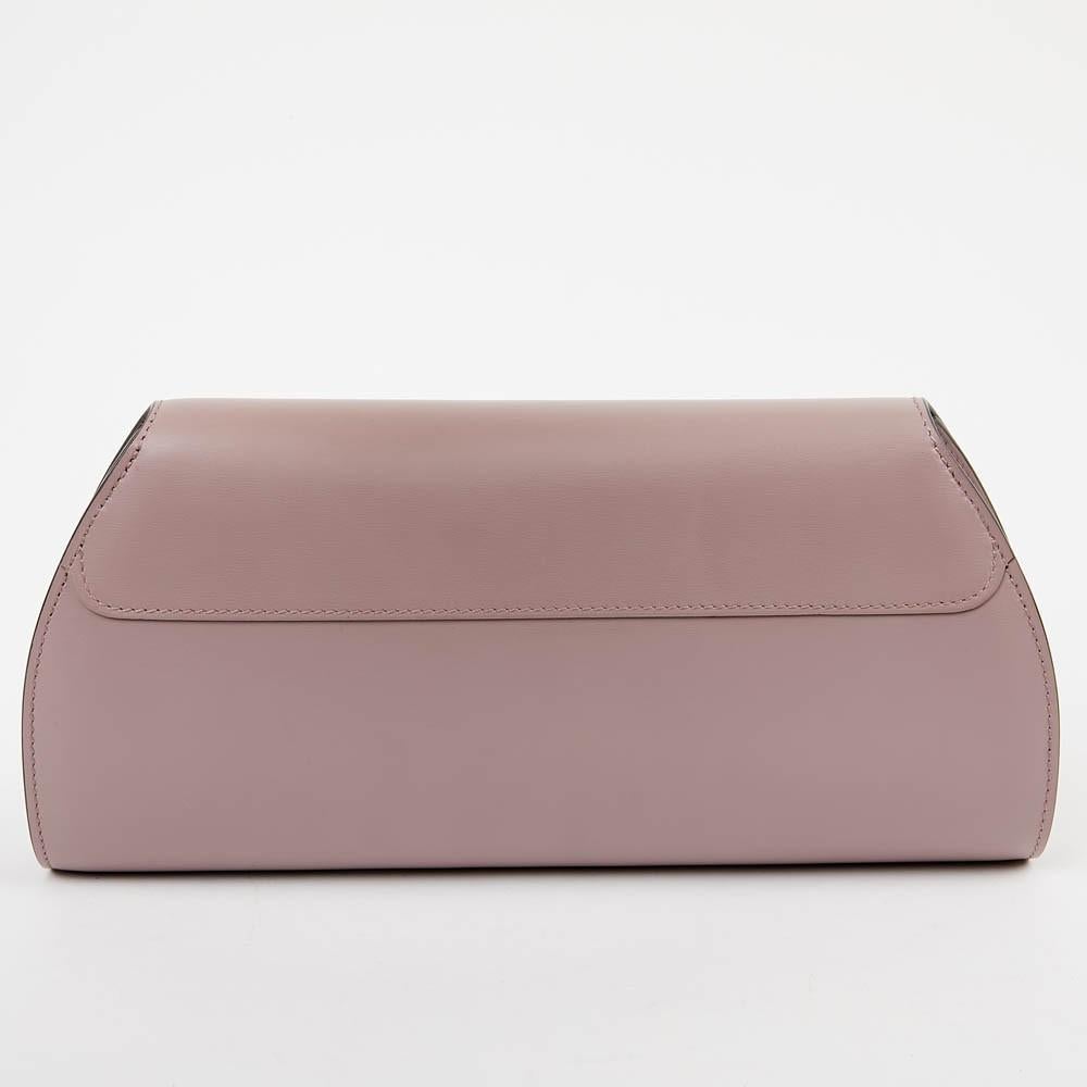 Never used Moynat clutch in parma colour. The inner lining is made of beige calfskin. Dimensions : 28 cm long x 14 cm high x 5 cm deep. Will be delivered in its MOYNAT's dustbag 