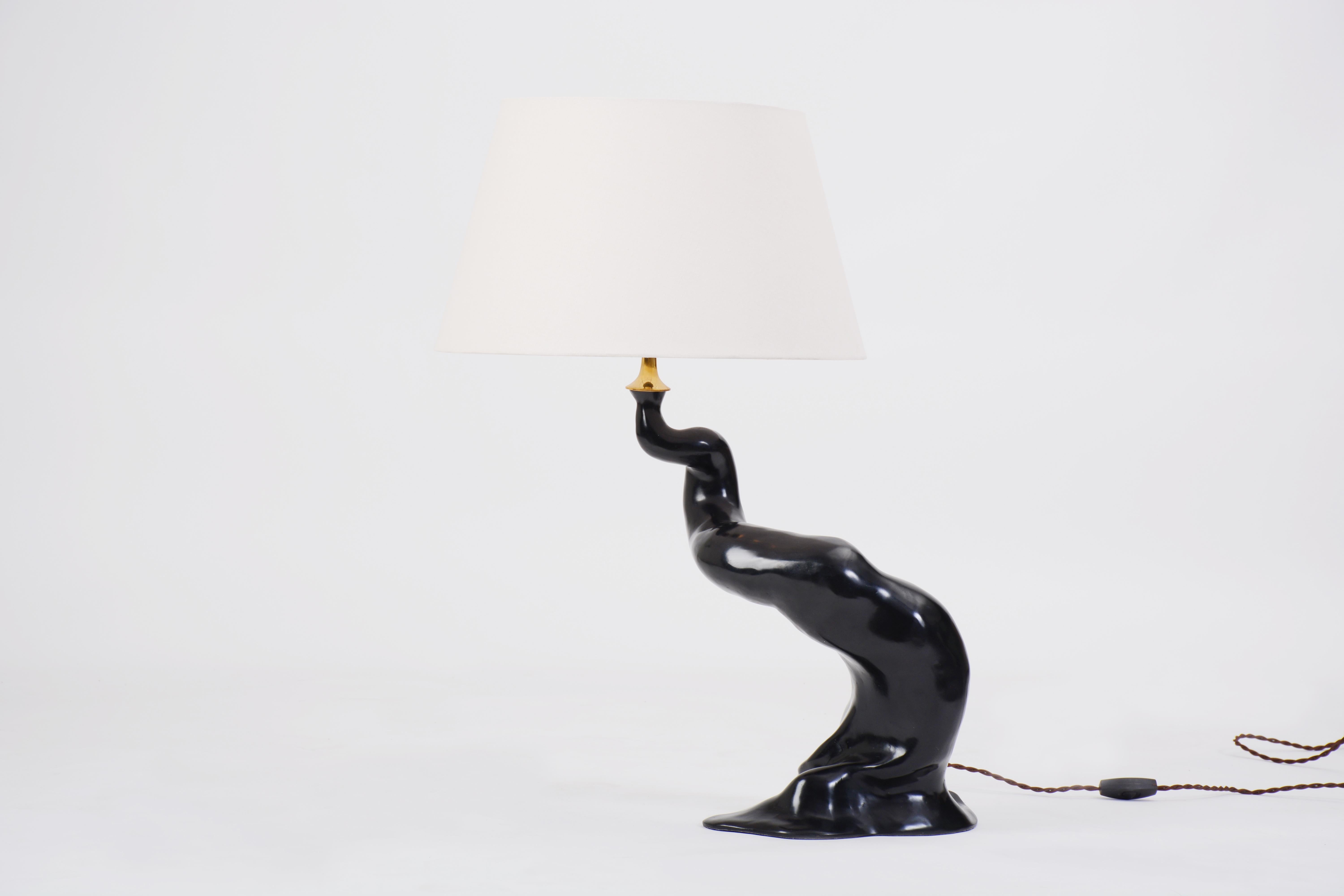 Moyogi Lamp in Cast Bronze by Elan Atelier

Moyogi lamp is cast using the lost wax method. Shown in our dark bronze finish with linen shade, the lamp is available standard in Large and Small sizes. Custom sizes and bespoke finishes are available by