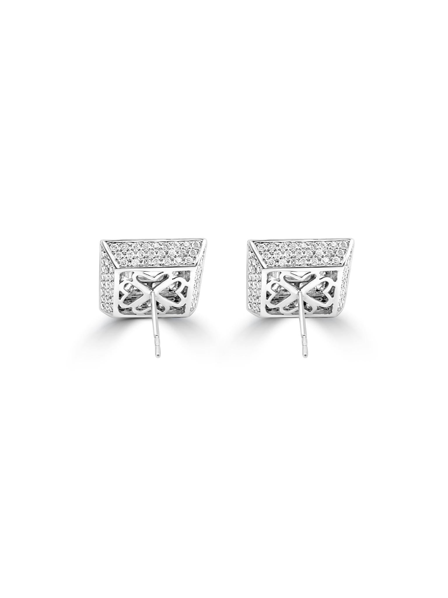 These elegant earrings are crafted from 18-karat white gold, featuring a seamless blend of baguette and round diamonds. The diamonds are arranged in a square design, with baguette-cut diamonds at the center, framed by a halo of round diamonds. The