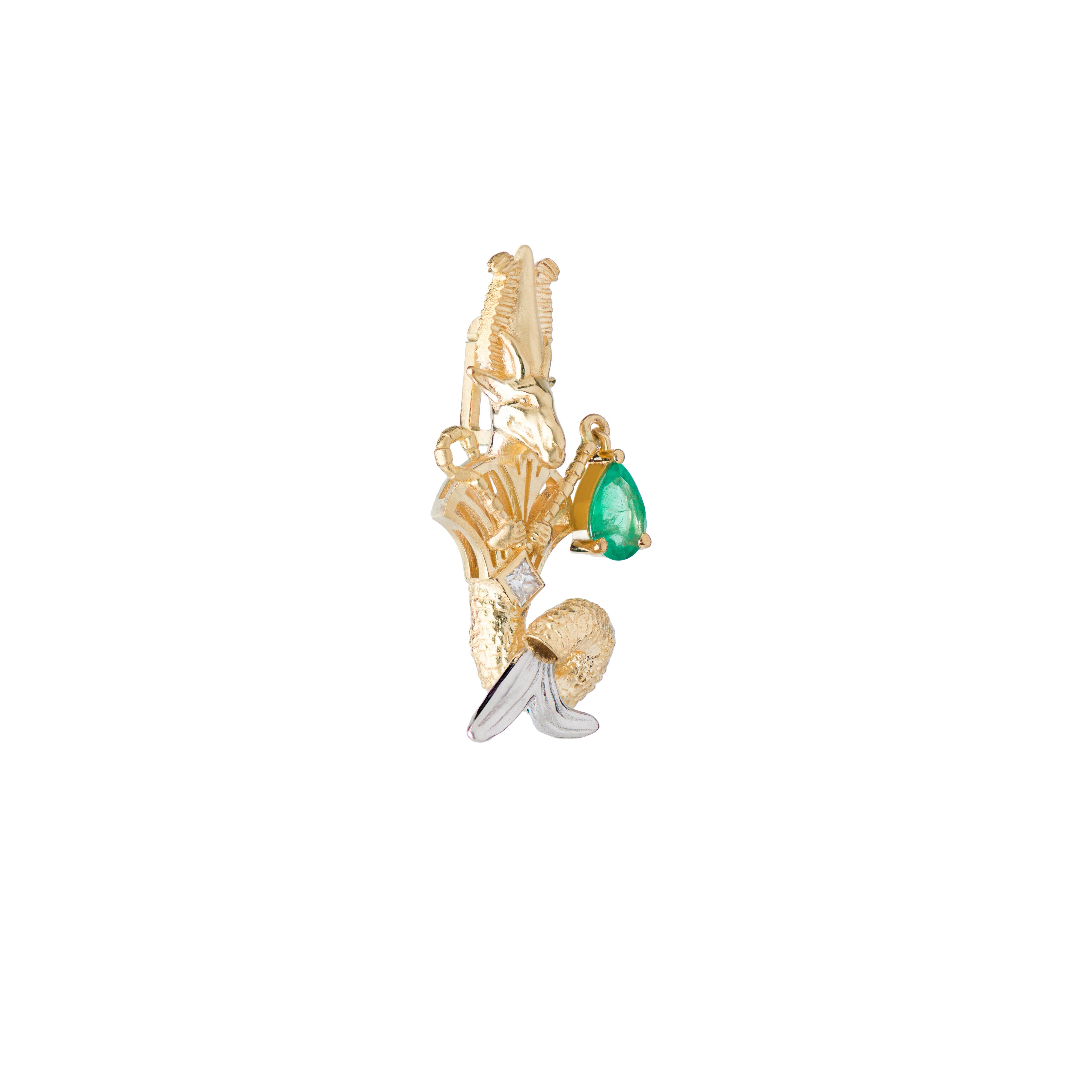 Der Steinbock-Anhänger, eine Collaboration zwischen Mozafarian und Katarina Tarazi, ist eine Hommage an Osiris, den Vater aller altägyptischen Götter.

Dieses bezaubernde Schmuckstück besteht aus einem weißen Diamanten im Prinzess-Schliff von 0,06