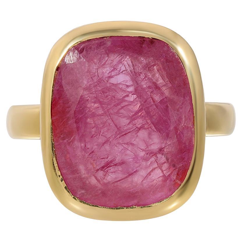 Mozambique Pink Ruby Diamond Contemporary Dress Ring featuring a natural pinkish red Mozambique Ruby in a  modern setting accented with brilliant cut diamonds on the bezel. The natural inclusions in the ruby add to the exceptional luminescence of