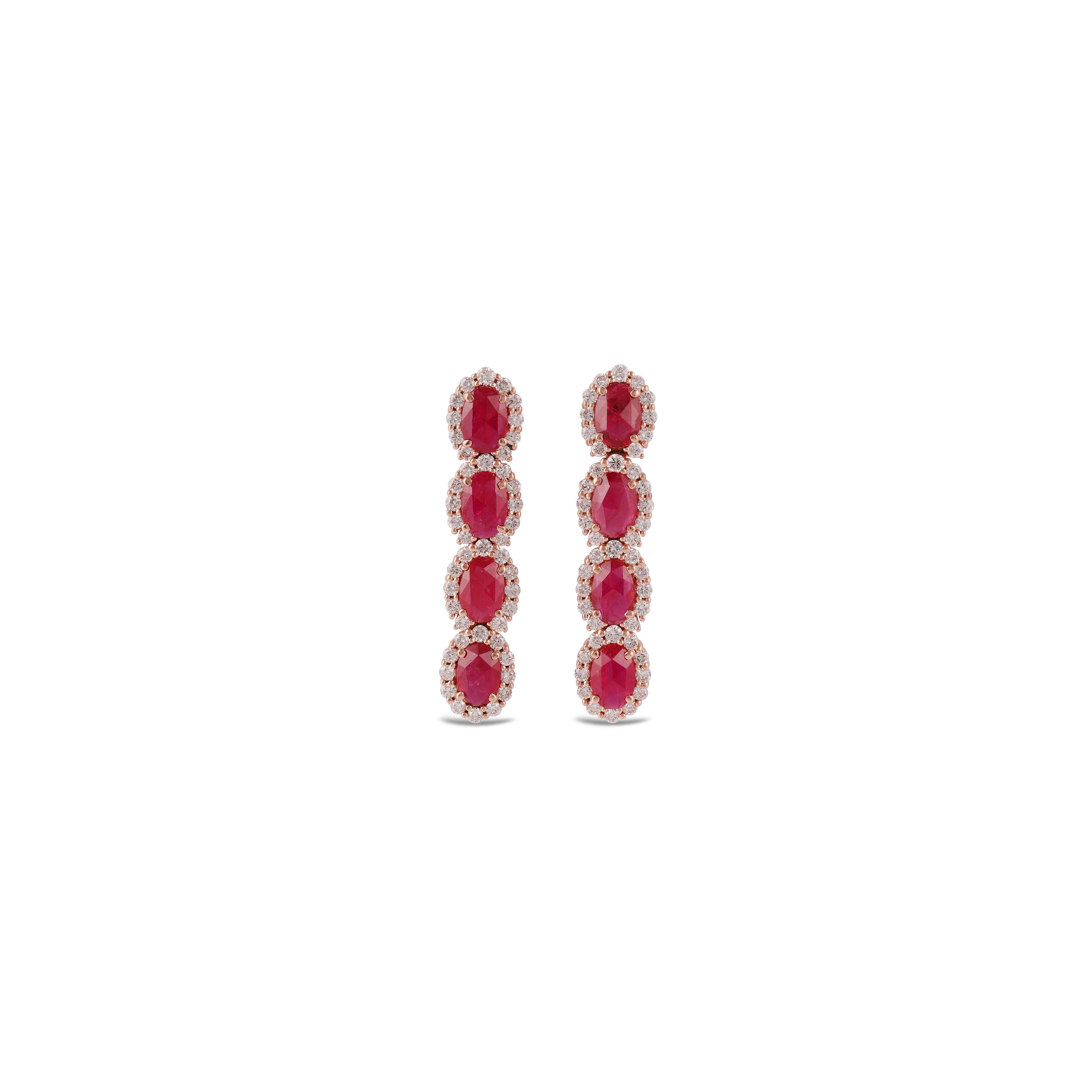 Magnificent Ruby and Diamond Earrings Studded in 18 Karat Rose Gold

These are an exclusive earrings with ruby & diamonds features 8 pieces of rubies weight 3.06 carats, surrounded with 90 pieces of diamonds weight 1.05 carats, these entire earrings