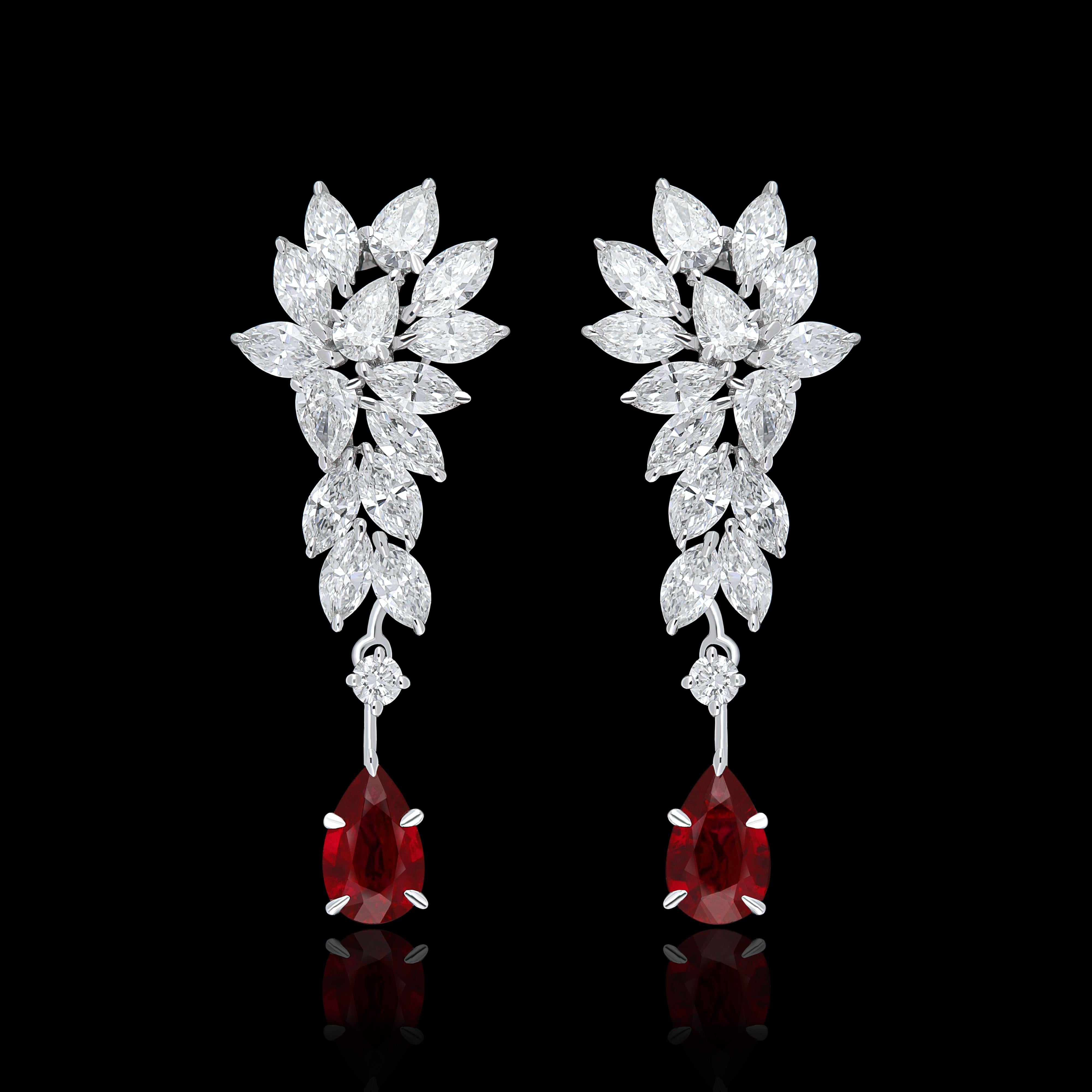 Elegant and exquisitely detailed 18 Karat White Gold Earring, center set with 0.69Cts .Pear Shape Ruby Mozambique and micro pave set Diamonds, weighing approx. 1.76Cts Beautifully Hand crafted in 18 Karat White Gold.

Stone Detail:
Ruby Mozambique: