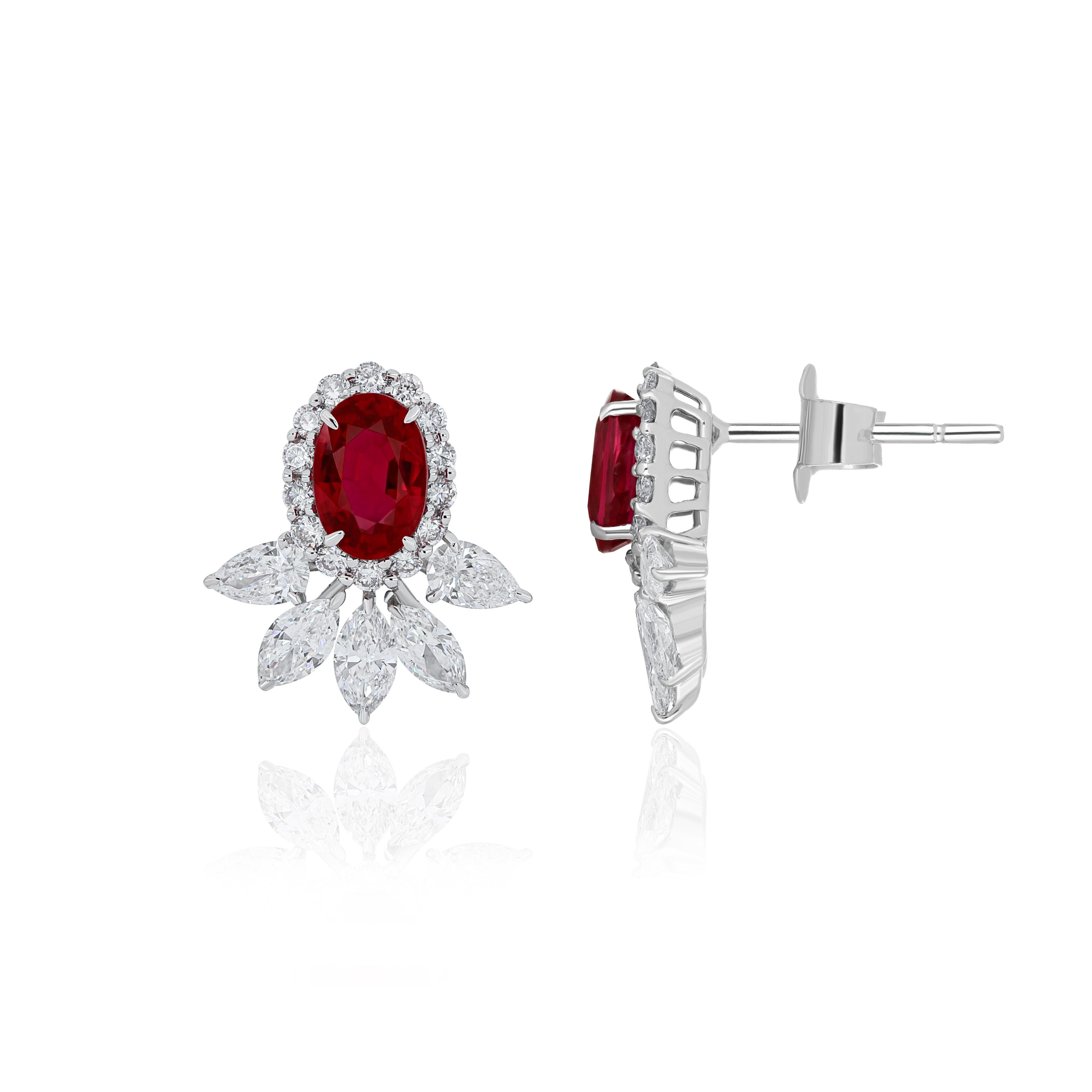 Oval Cut Mozambique Ruby and Diamond Studded Earrings in 18 Karat White Gold For Sale