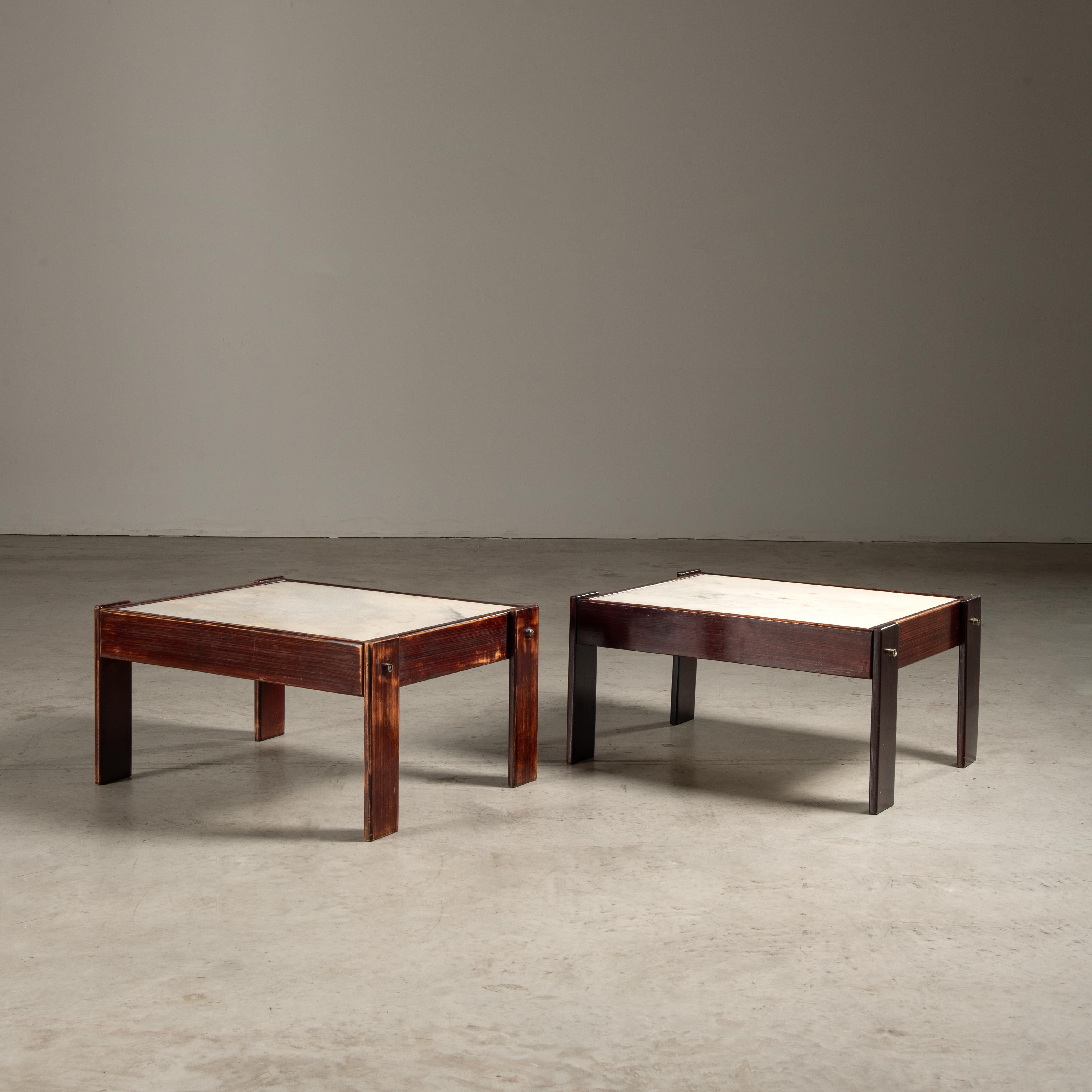 This pair of MP-85 side tables embodies the essential qualities of mid-century modern Brazilian design, a period known for its innovative use of materials and clean, geometric lines. Designed by the celebrated Percival Lafer, these tables are a