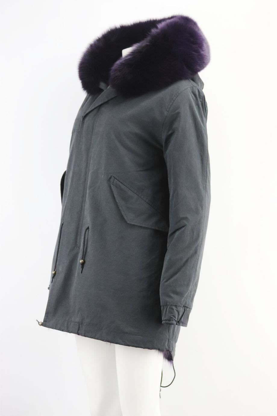 Mr & Mrs Italy fox fur lined cotton canvas parka coat. Black and purple. Long sleeve, crewneck. Zip fastening at front. 45% Cotton, 39% polyester, 16% polyamide; fabric 2: 100% leather; sleeve lining: 83% polyester, 17% polypropylene; lining2: 100%