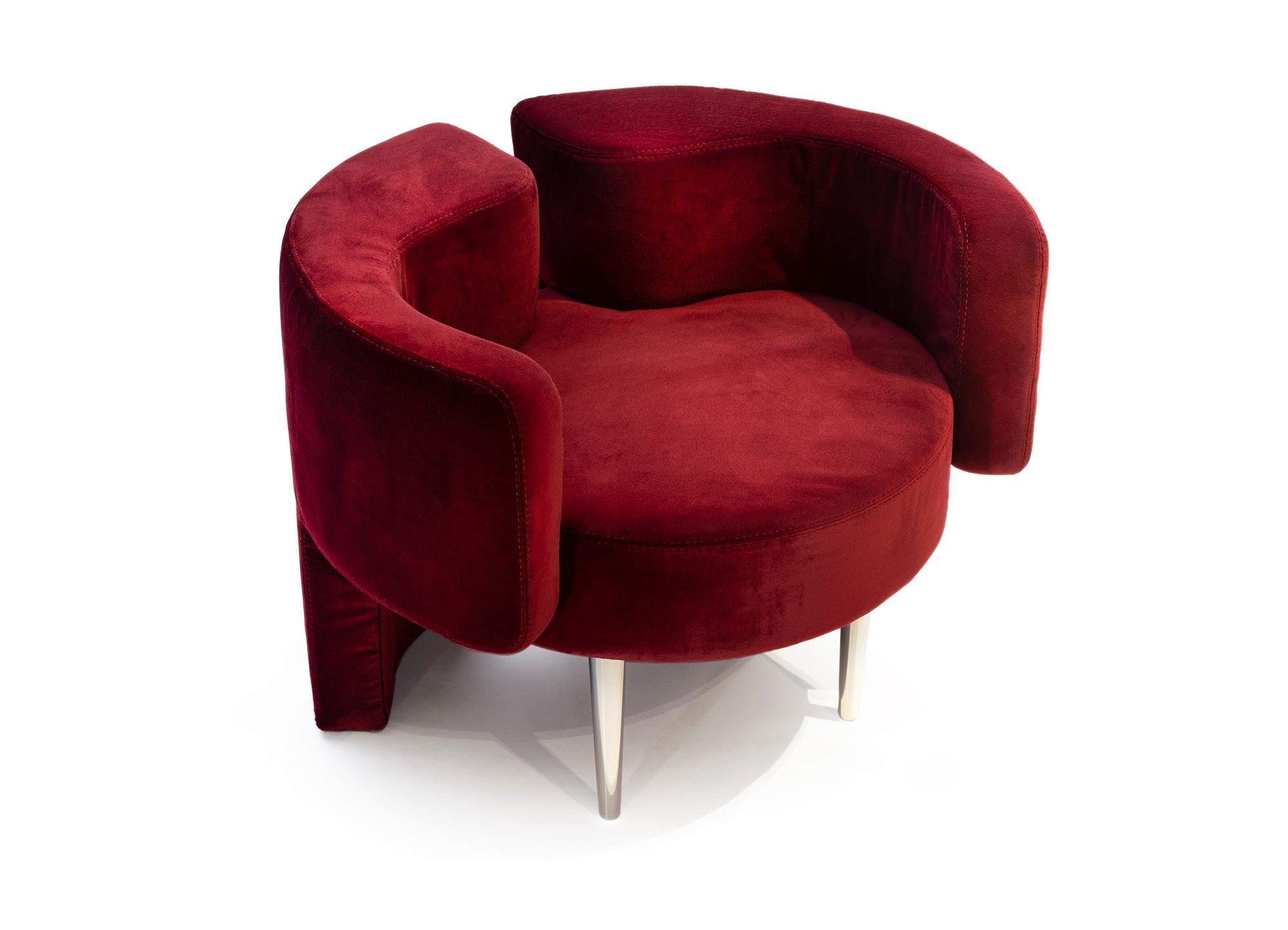 MR Armchair - 21st century contemporary red velvet and solid aluminum legs circular armchair

A soothing, intimate feeling of comfort and placidity in tandem with strong presence underlie the concept of MR armchair. 
Symmetrical velvet “wings”