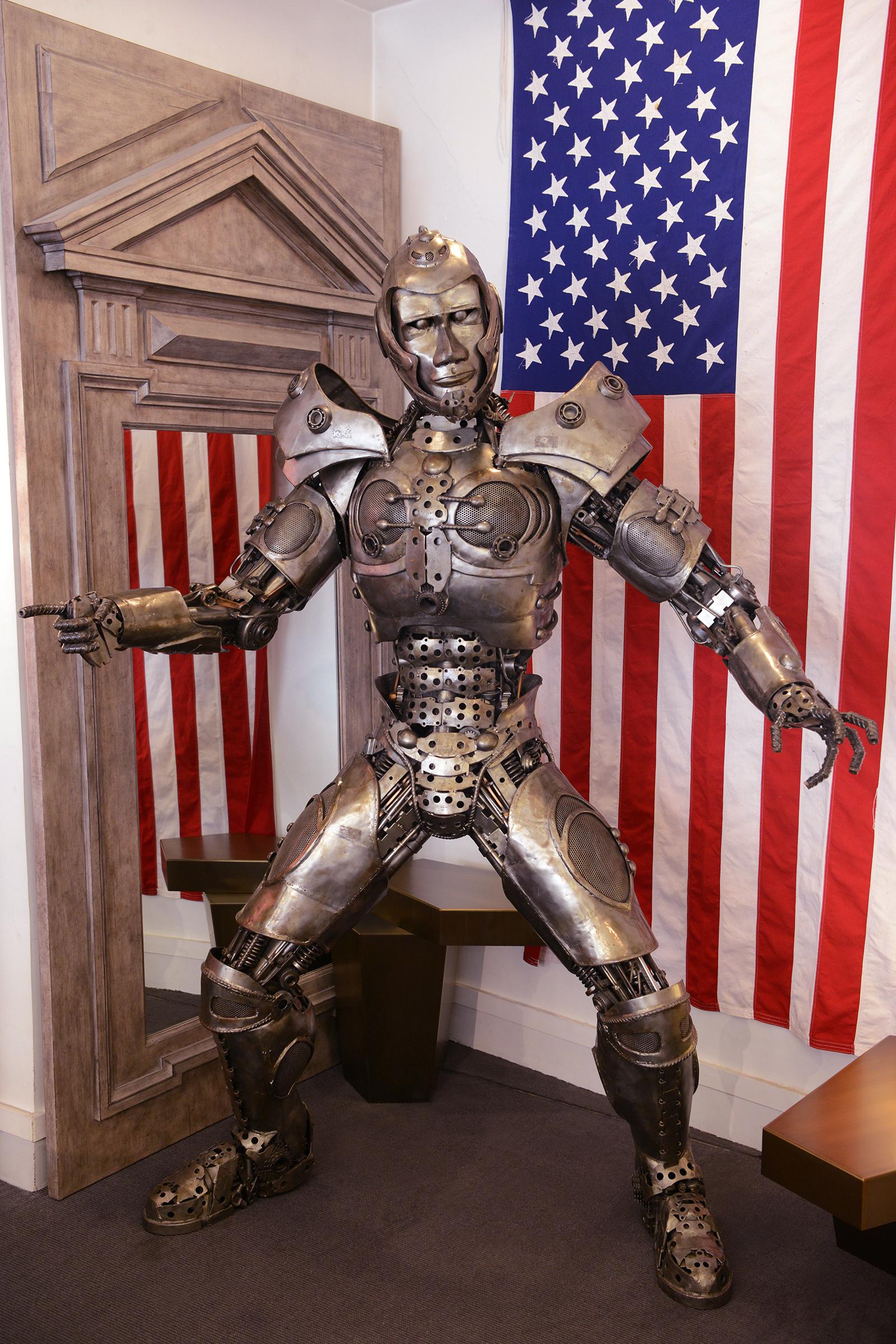 Sculpture Mr Boy Robot Warrior, 2004 Important steel 
sculpture from 2004 made up of an assembly of mechanical 
parts from various welded automobile salvage. Representing a 
robot warrior made raw hand-crafted, welded polished mechanical 
parts.