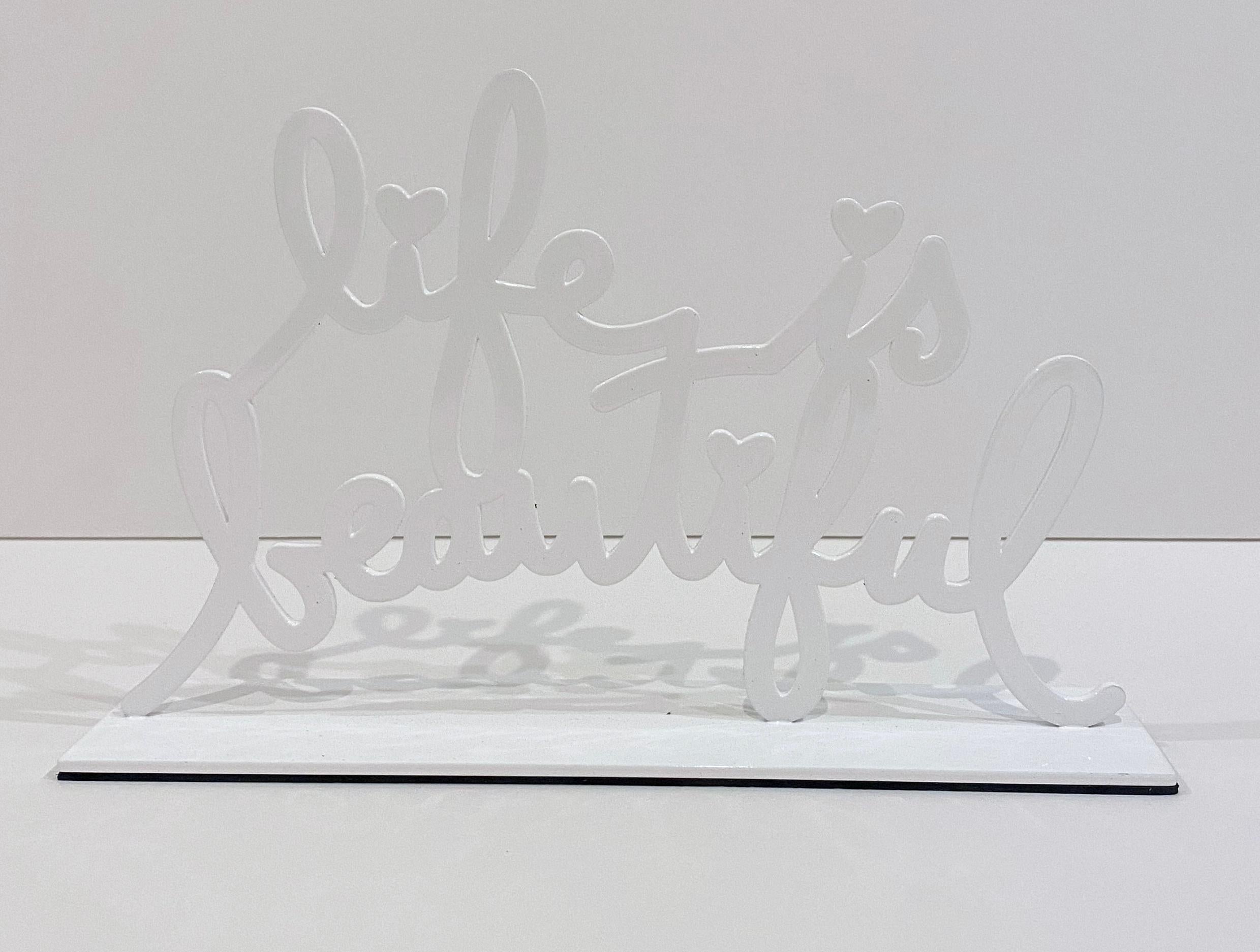 Mr. Brainwash Life is Beautiful Sculpture (White)
Artist: Mr. Brainwash
Medium: Coated metal sculpture
Title: Life is Beautiful (White)
Year: 2022
Edition: 18/50
Image Size: 7" x 10 1/2" x 2 1/2"
Signed: Hand signed, numbered, and dated in silver ink