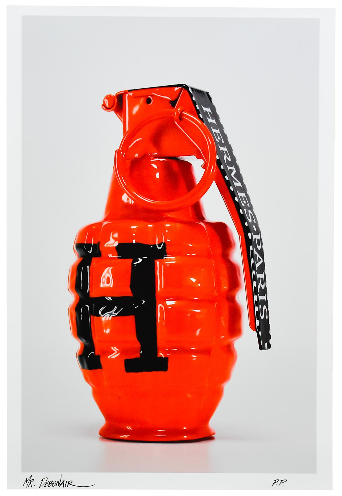 Stunning Hermes inspired Art Grenade Print by Mr. Debonair.
Instantly recognizable luxury motif remixed by the artist.
Large H on the orange grenade.
Super rare Printers Proof Print.
Hand signed by Mr. Debonair with black ink on bottom left of print