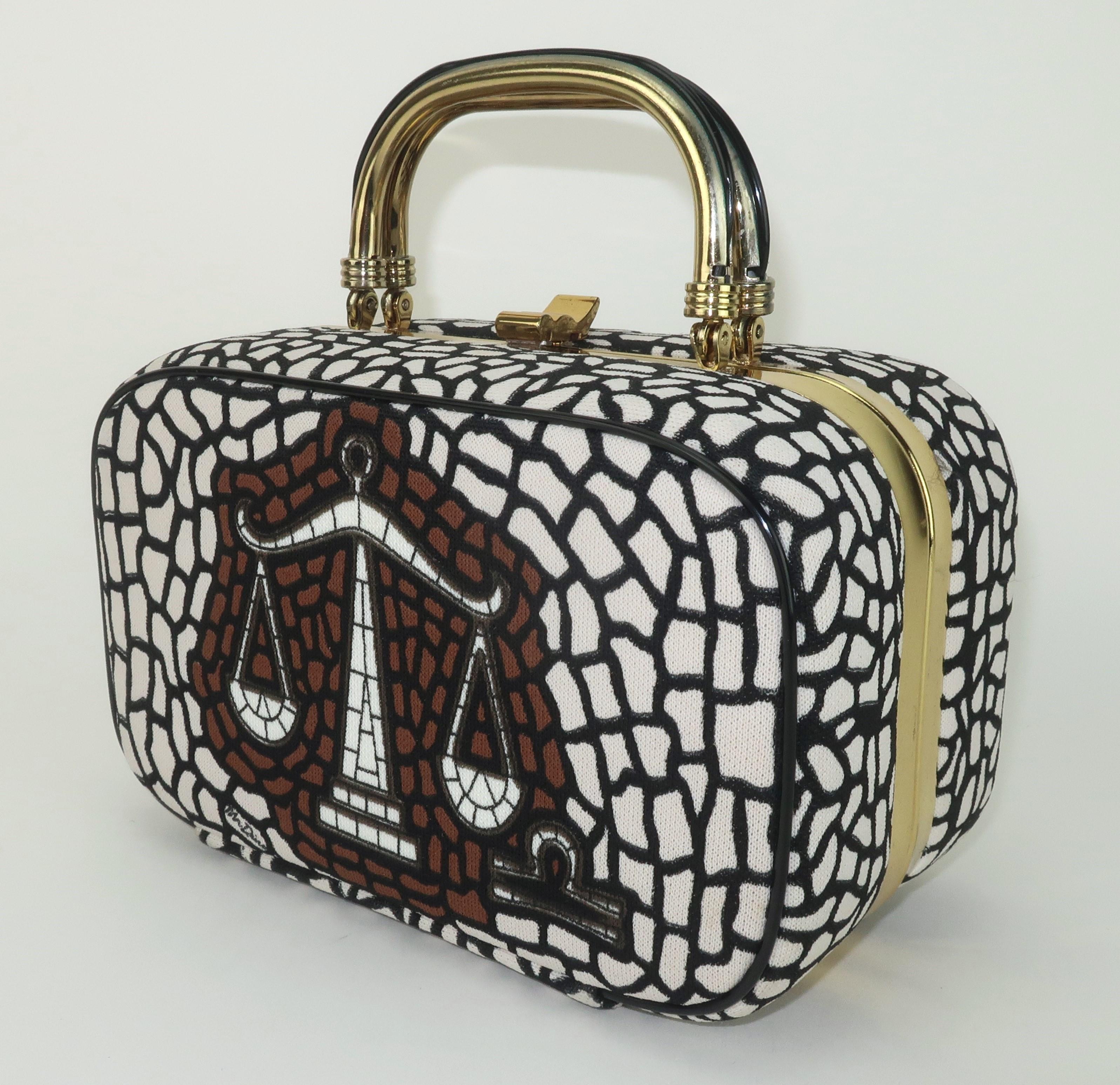 Libras are considered to be the connoisseurs of the Zodiac.  How fitting that Mr. Dino, aka Max Cohen, created a stylish 1960's box shaped handbag in collaboration with Lou Taylor Inc. for the Libras and their perfectly balanced scales.  The body of