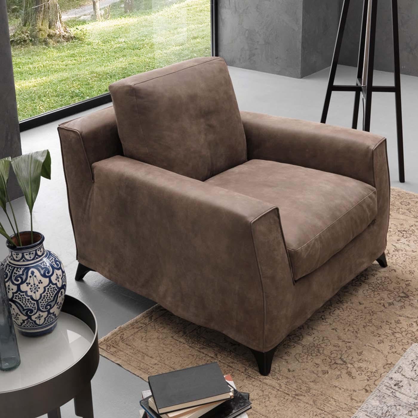 Part of the Floyd collection, this sophisticated and comfortable armchair will be a versatile addition to any decor. Its clean lines are of crush-proof polyurethane padding that covers the wooden structure, with velveteen lining and weaved-in