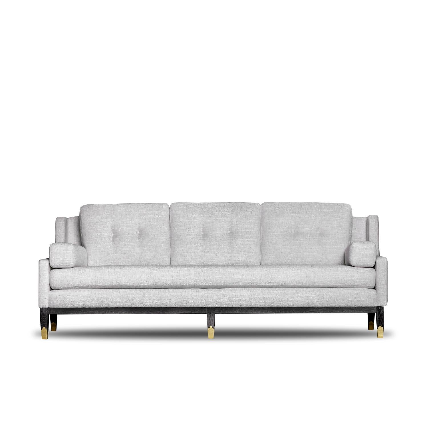 Mr Jones Sofa by DUISTT 
Dimensions: W 222 x D 92 x H 80 cm
Materials: Duistt Fabric, Natural Limed Oak, Brass

MR. JONES sofa is a piece with classical influence with sleek design and details. It fits perfectly in classic and modern interiors. The