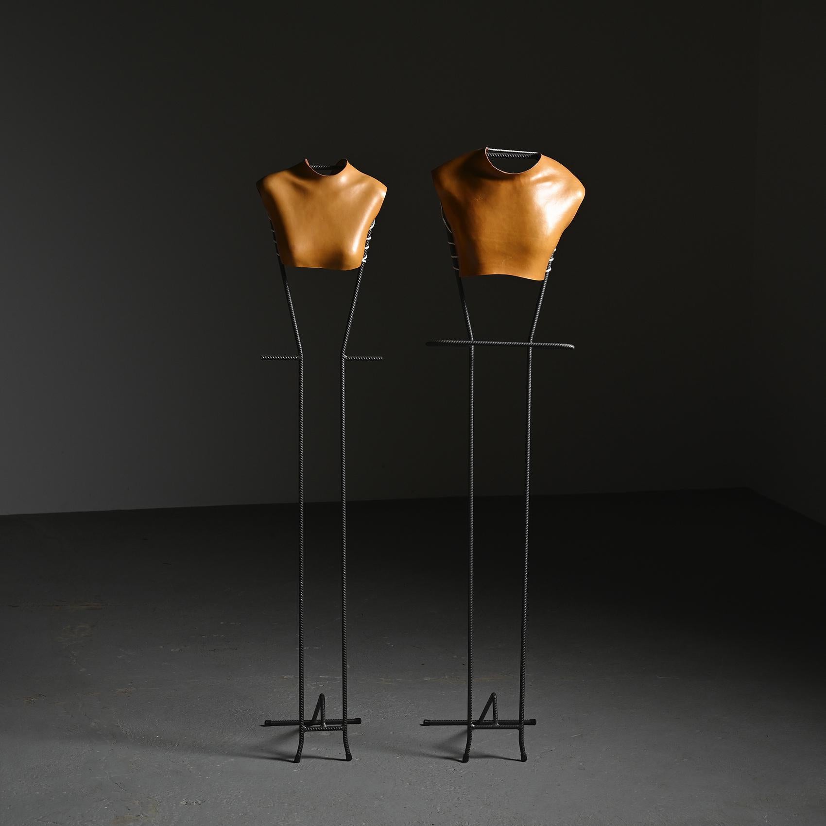 
Couple of bedroom valets, the Mr & Mrs Heart model, envisioned by Swiss designer Robert Wettstein in the 1980s.

Crafted by hand with artisanal precision, each features a wrought iron frame embracing a molded leather bust of either a man or a