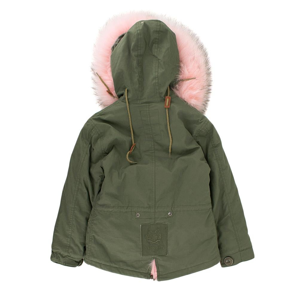 Mr & Mrs Italy Girl's Pink Alpaca Lined Parka

Green cotton exterior
Genuine alpaca fur lining
Elastic and buttons at wrist for expansion
Fur-lined hood attached
All zippers, buttons, and pockets in excellent condition

Please note, these items are