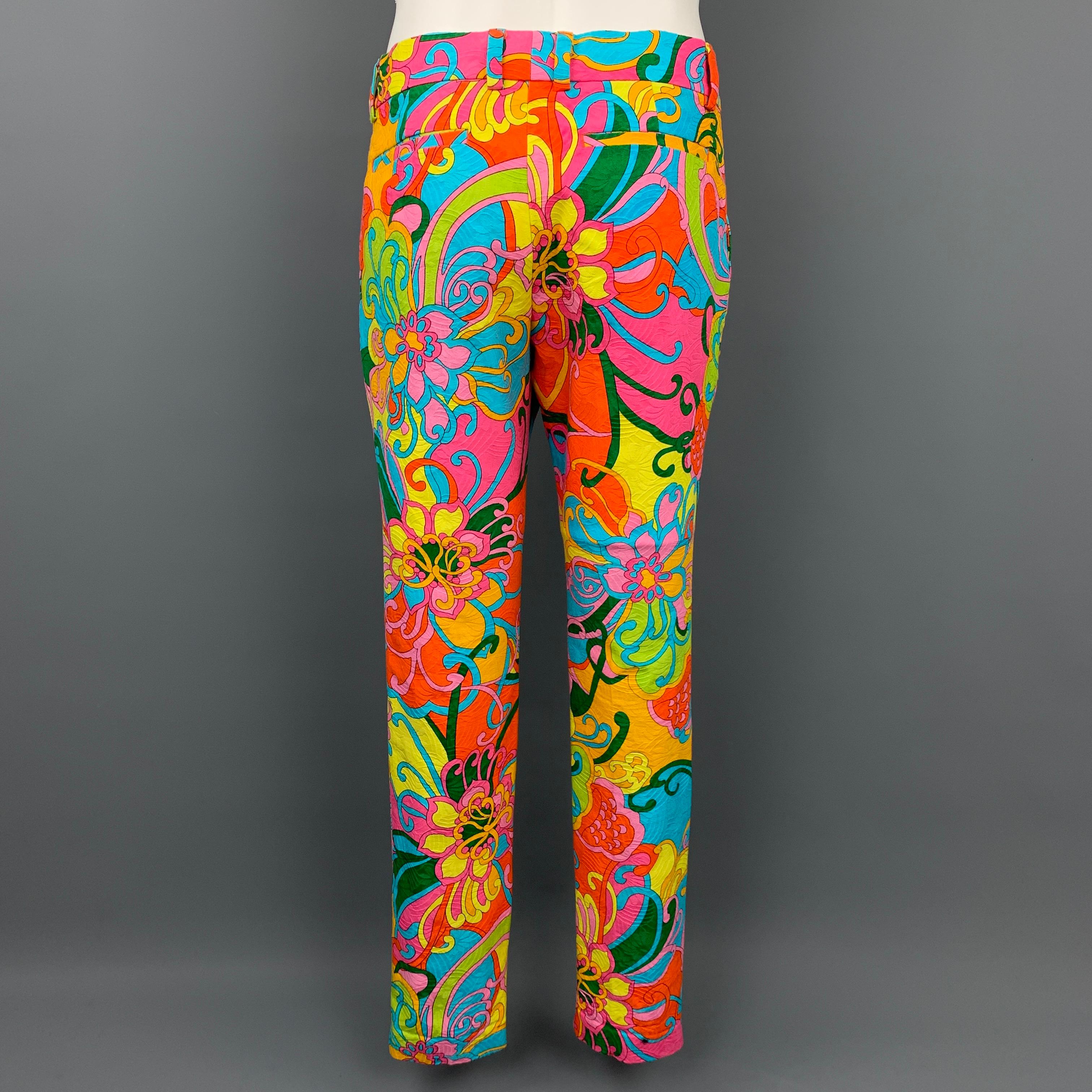 MR TURK casual pants comes in a multi-color print cotton featuring a slim fit, front tab, and a zip fly closure. Made in USA.

Excellent Pre-Owned Condition.
Marked: 30

Measurements:

Waist: 32 in.
Rise: 9.5 in.
Inseam: 31 in. 