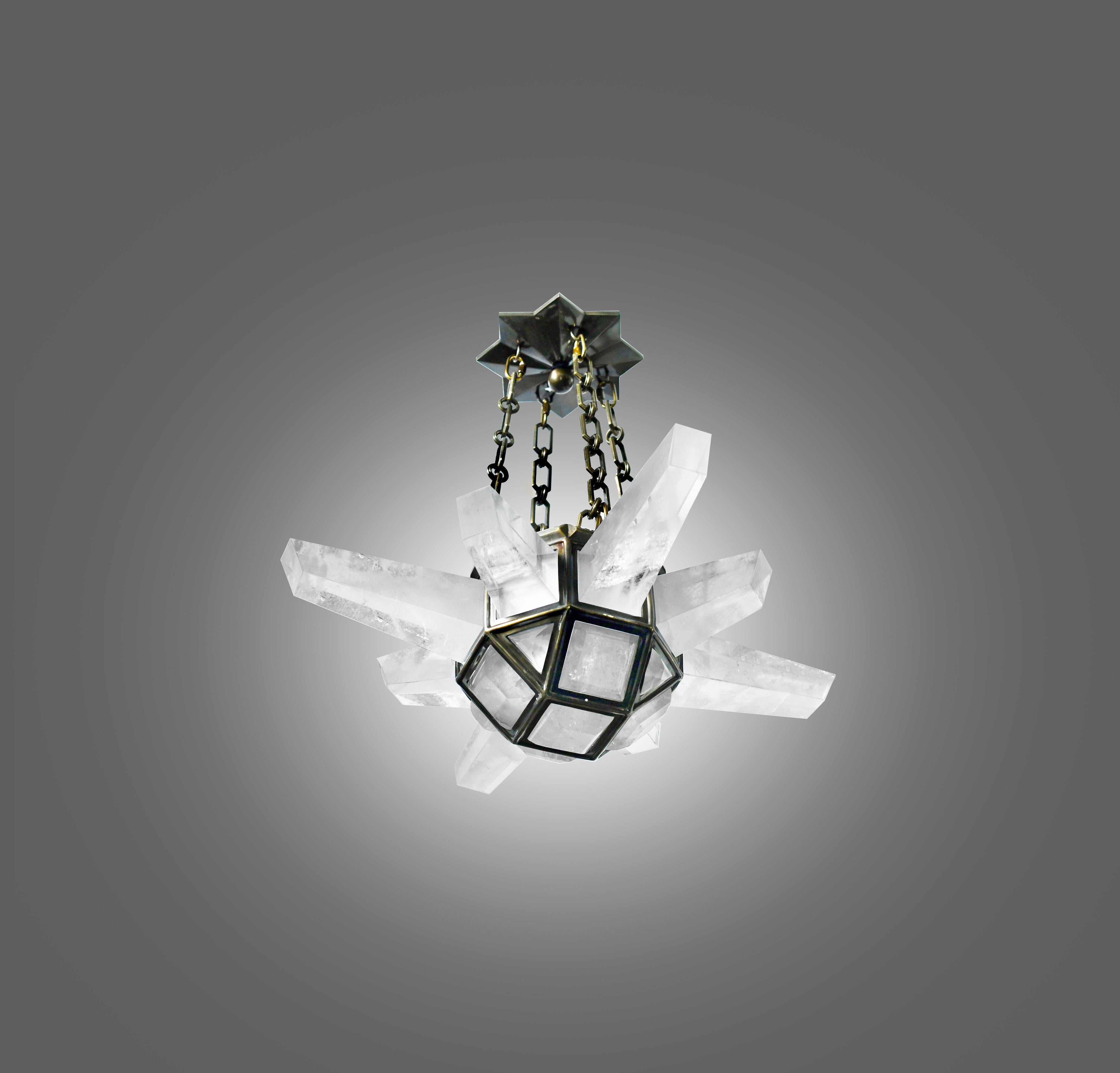 Fine carved multiple spikes rock crystal chandelier. Antique brass finish frame. Created by Phoenix Gallery.
Custom high upon request.