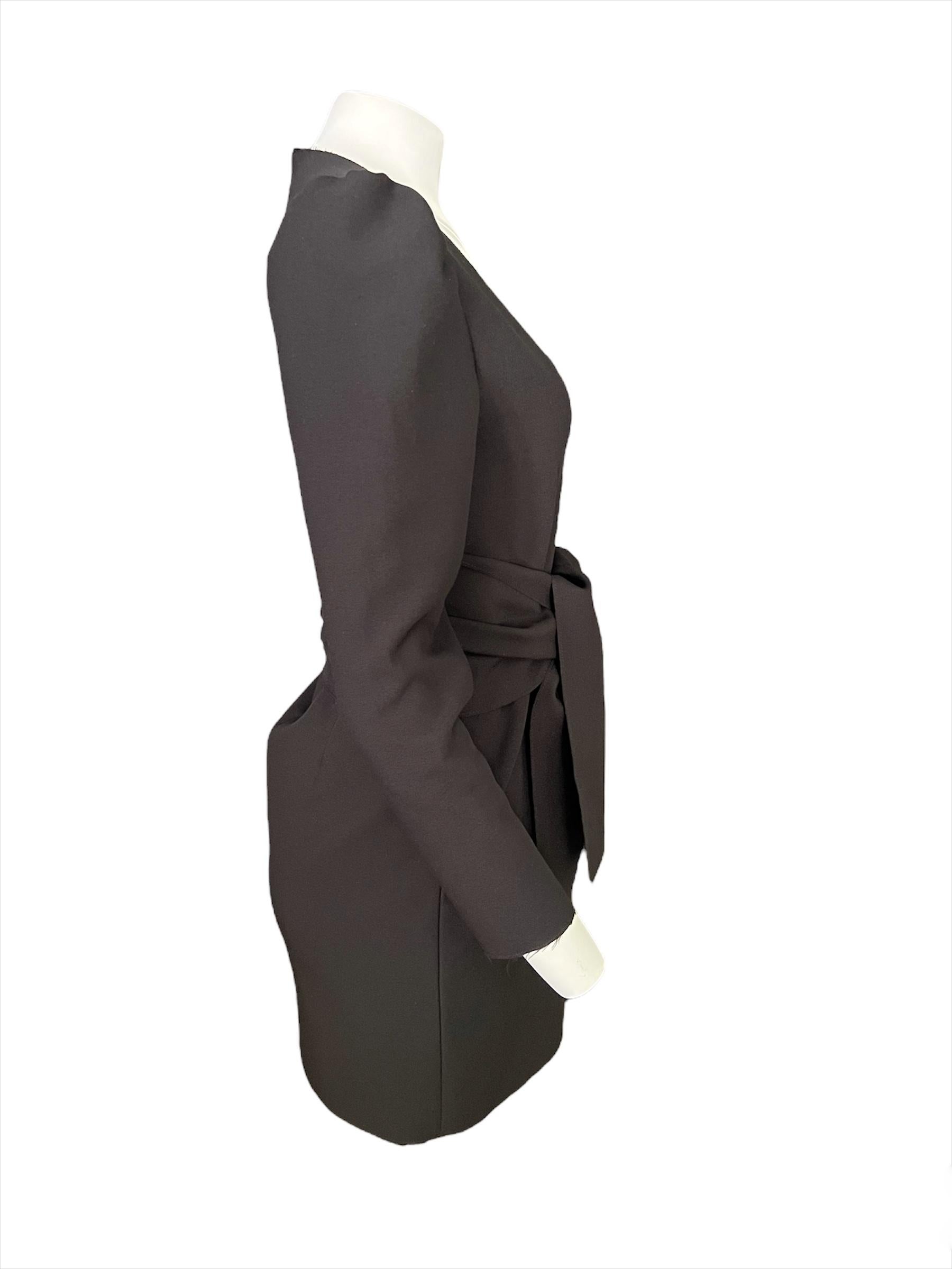 - Long balloon sleeves
- Deep V neckline
- Mini length
- Belted design detail
- Rear concealed zip closure