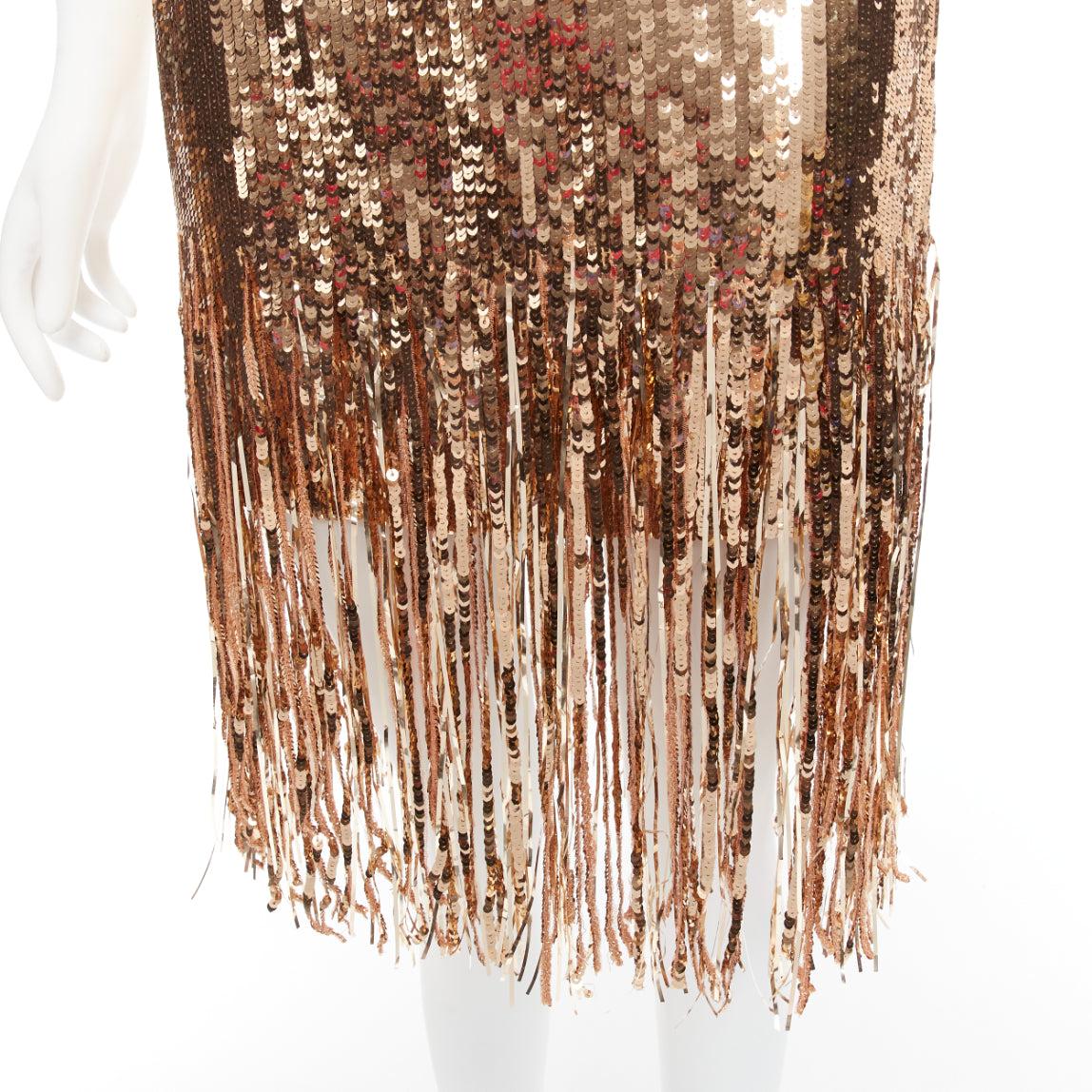 MSGM metallic gold sequins fringe hem flapped skirt IT38 XS
Reference: AAWC/A00580
Brand: MSGM
Material: Polyester
Color: Gold
Pattern: Solid
Closure: Zip
Lining: Black Polyester
Extra Details: Fringe hem. Side closure. Fully lined.
Made in: