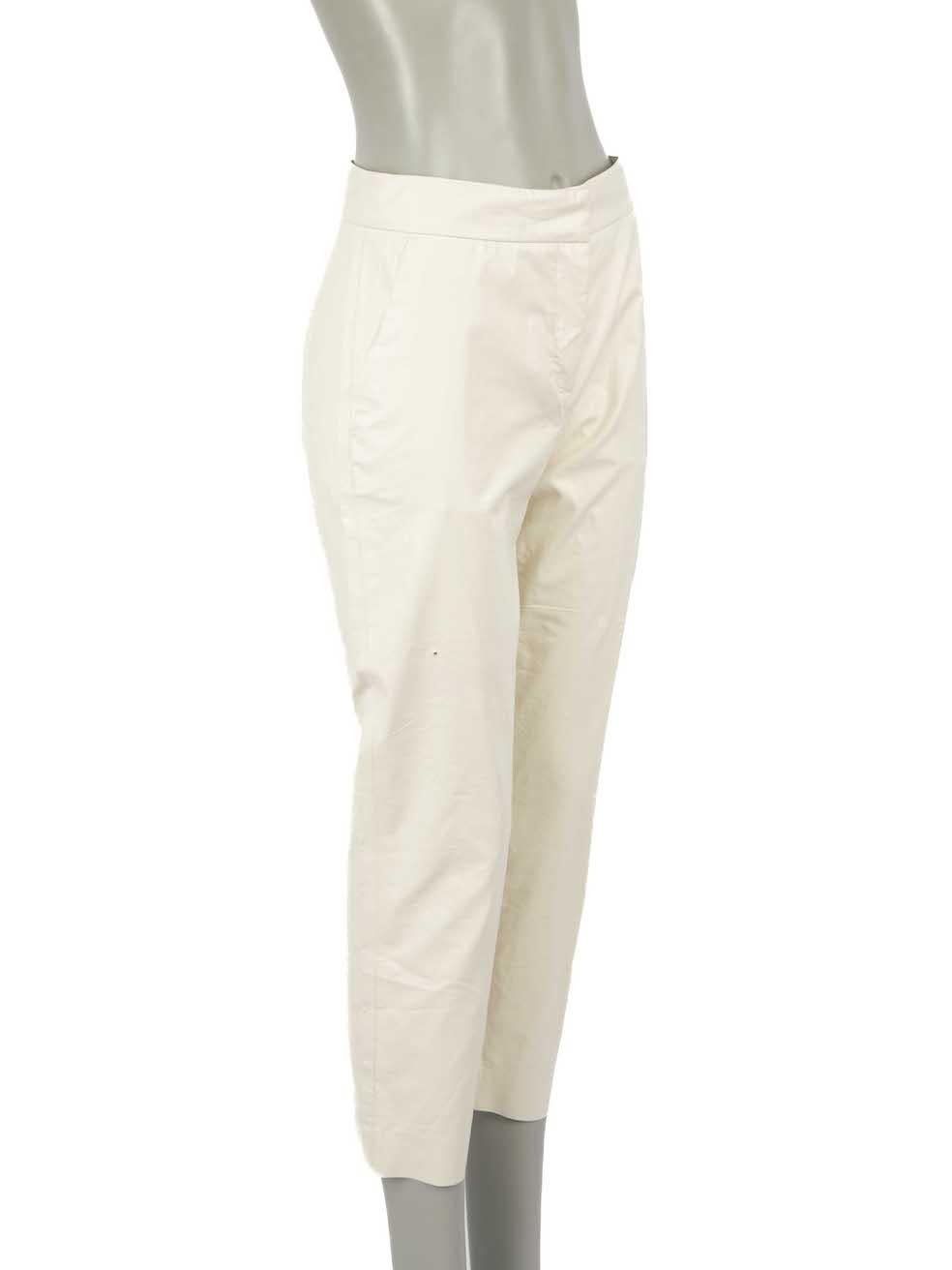 CONDITION is Good. Minor wear to trousers is evident. Light wear to PU surface with a handful of discoloured marks and small hole on right leg found throughout the front on this used MSGM designer resale item.
 
Details
White
Coated cotton
Straight
