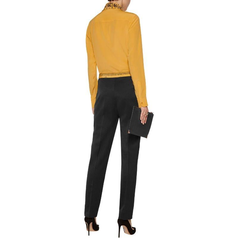 MSRP Moschino Couture Jeremy Scott Measure Tape Pleated Wool Tapered Pants 40 IT / US 6

Additional Information:
Material: 99% wool, 1% other fibers; fabric2: 100% silk    
Color: Black/Yellow    
Pattern: Measure Tape
Size: 40 IT / US 6
100%