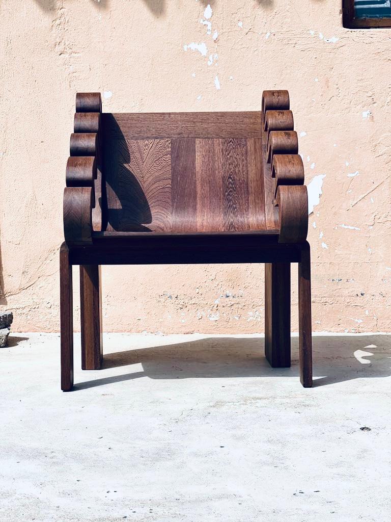 Hand made in Botswana by Mabeo Furniture; a brand that is known for producing hand made contemporary furniture in collaboration with craftspeople and renowned designers; using wood from sustainable Panga Panga wood that is sourced from a