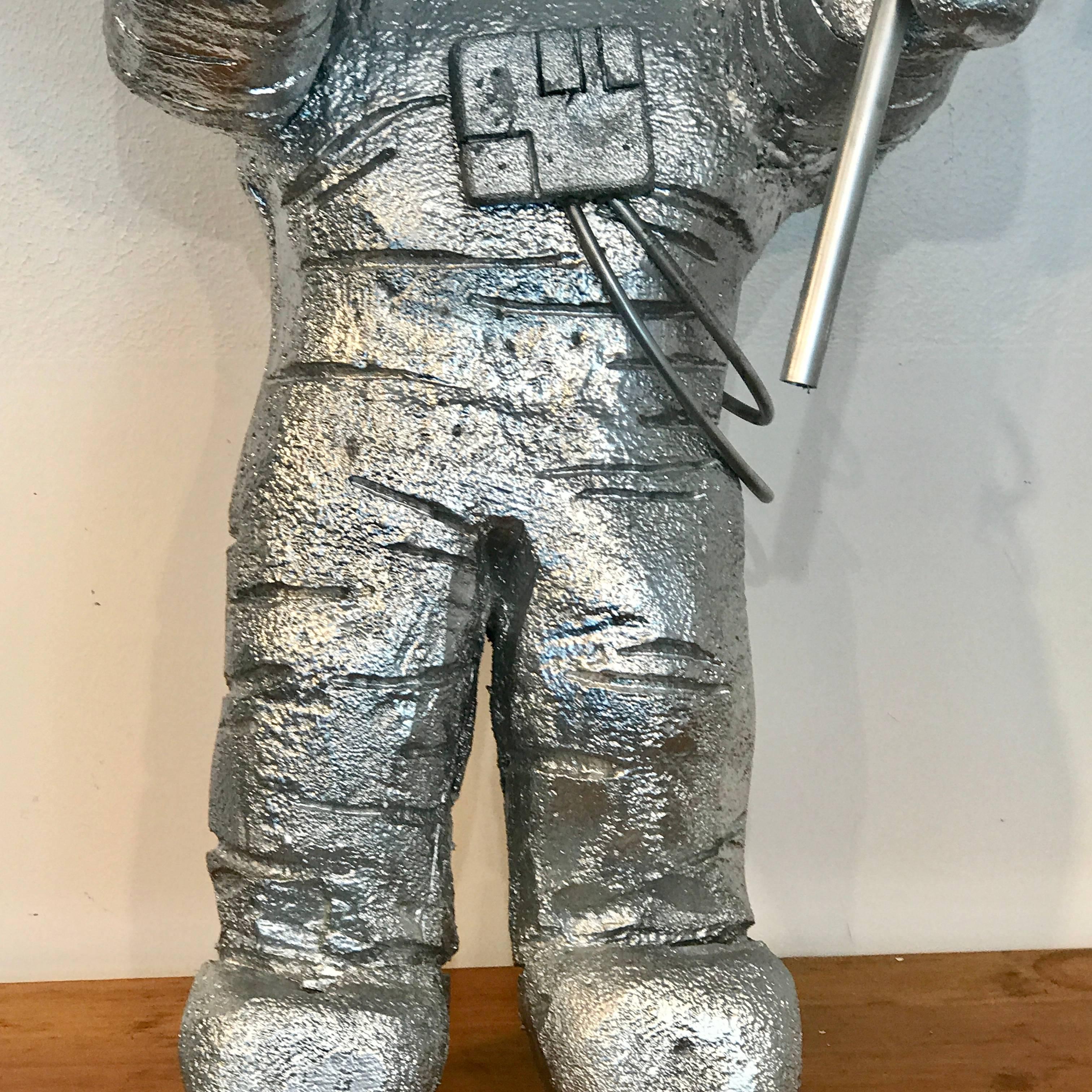 MTV Moonman Prop, A vintage realistically carved and modeled figure of the iconic MoonPerson out of blocks styrofoam, rubber, paperboard and other found prepared materials
Standing 40