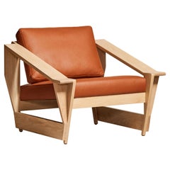 MŪ61 Solid Oak Lounge Chair with Leather Upholstery by MŪVEK
