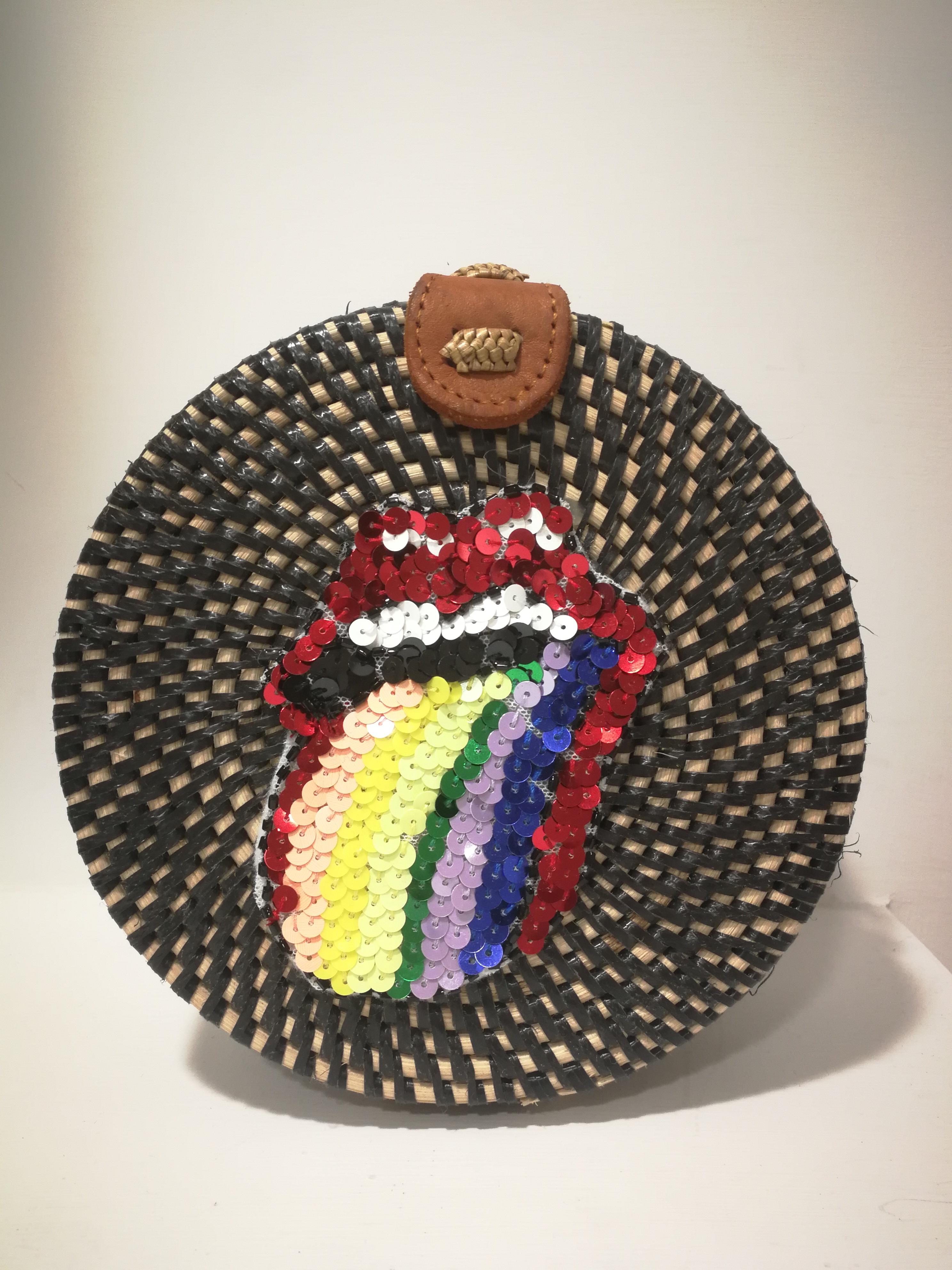 Mua Mua Raffia Round Shoulder Bag

Raffia shoulder bag totally handmade embellished with a multicoloured sequins tongue

measurementS: 15 x 15 cm