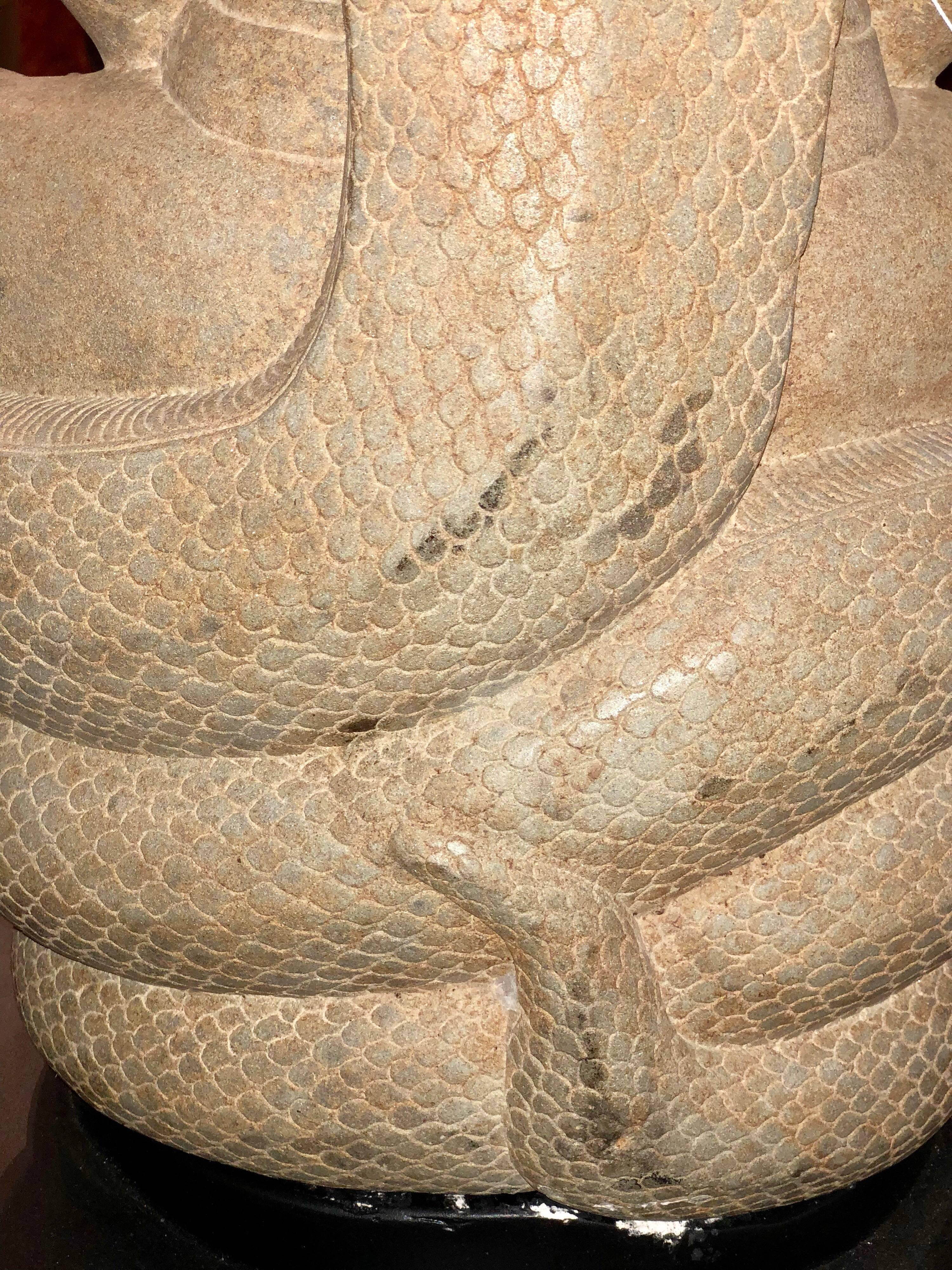 buddha with snakes