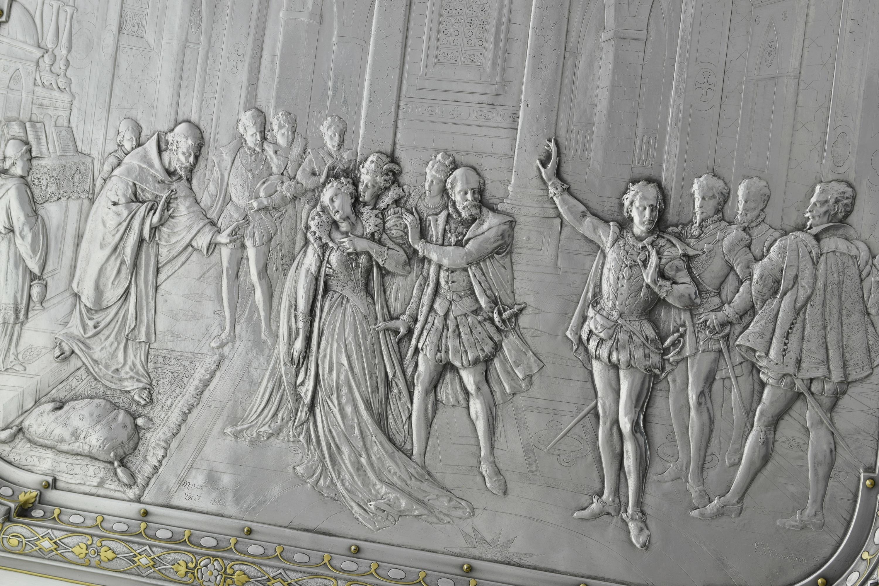 This parcel-gilt silver plated electrotype plaque demonstrates a marriage scene from the popular play 