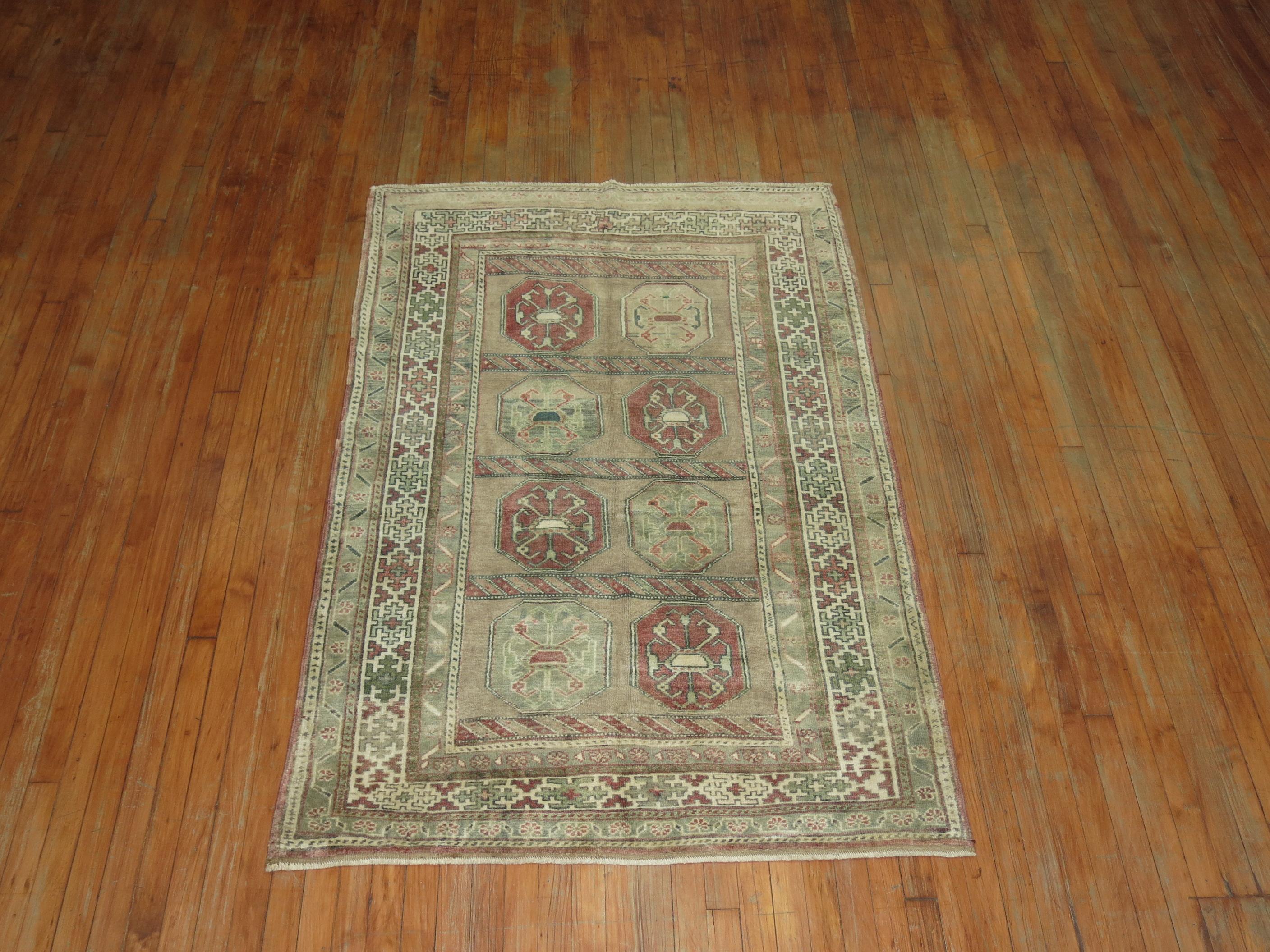 Mid 20th-century Turkish Anatolian rug in damp mud tones

 Measures: 4'1