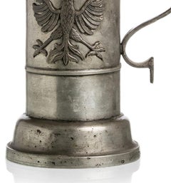 Mug decorated with a double-headed eagle.
