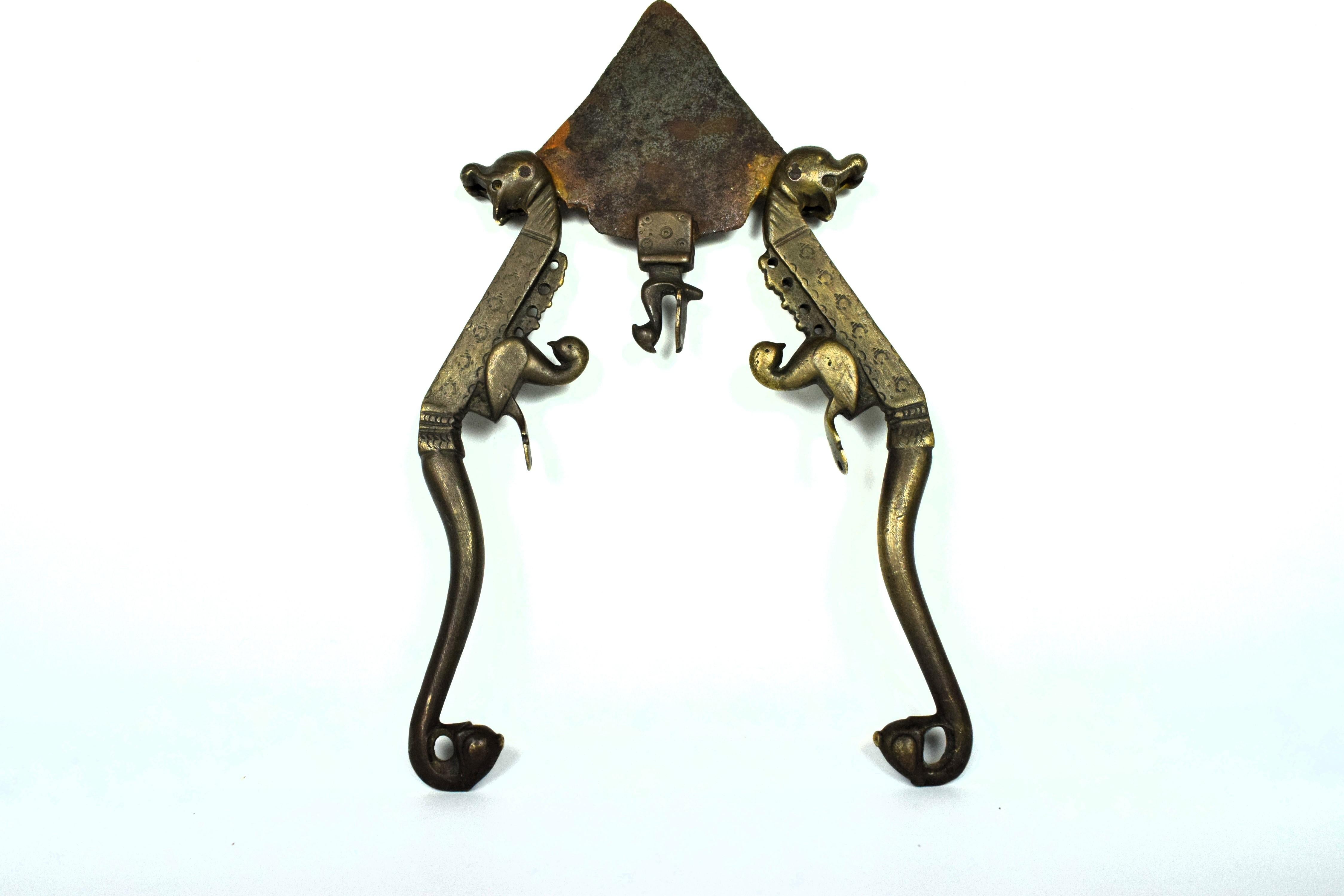 A 19th-century Mughal brass betel nut cutter, also known as a 