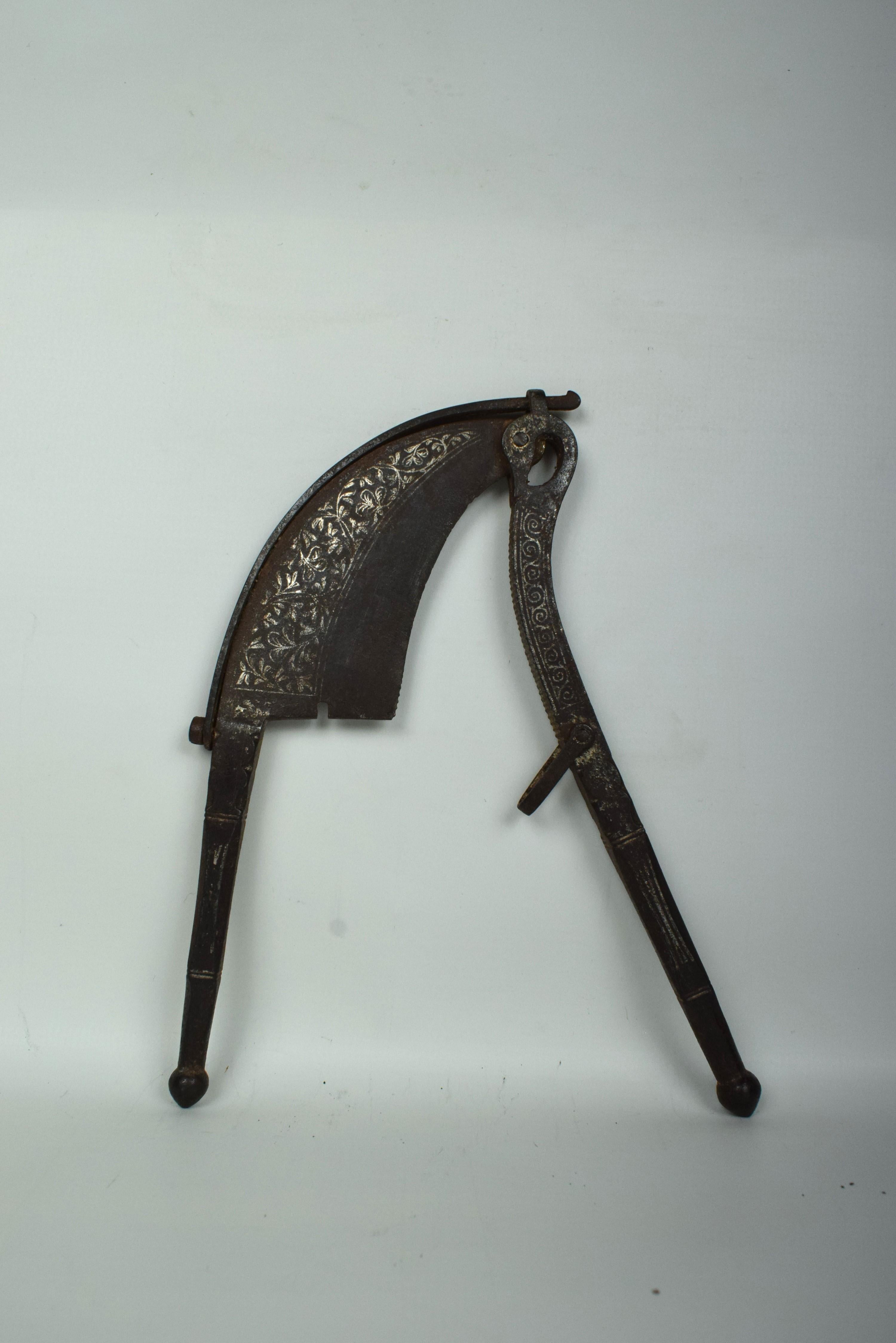 A 19th-century Mughal brass betel nut cutter, also known as a 