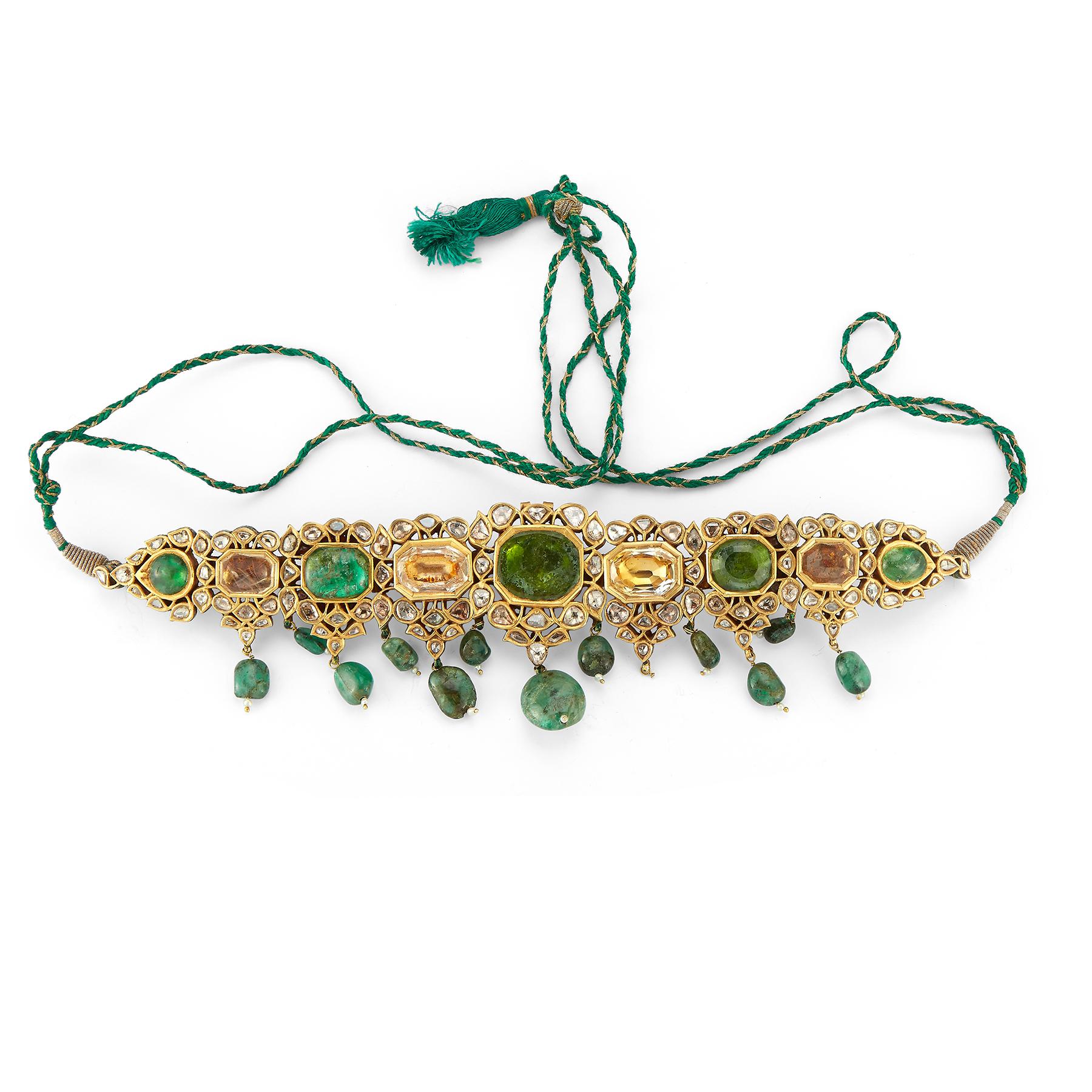 Mughal Indian Emerald Necklace
With ornate hand enamel on the reverse
Adjustable cord for length
Made circa 1850
Measurements: 8.5