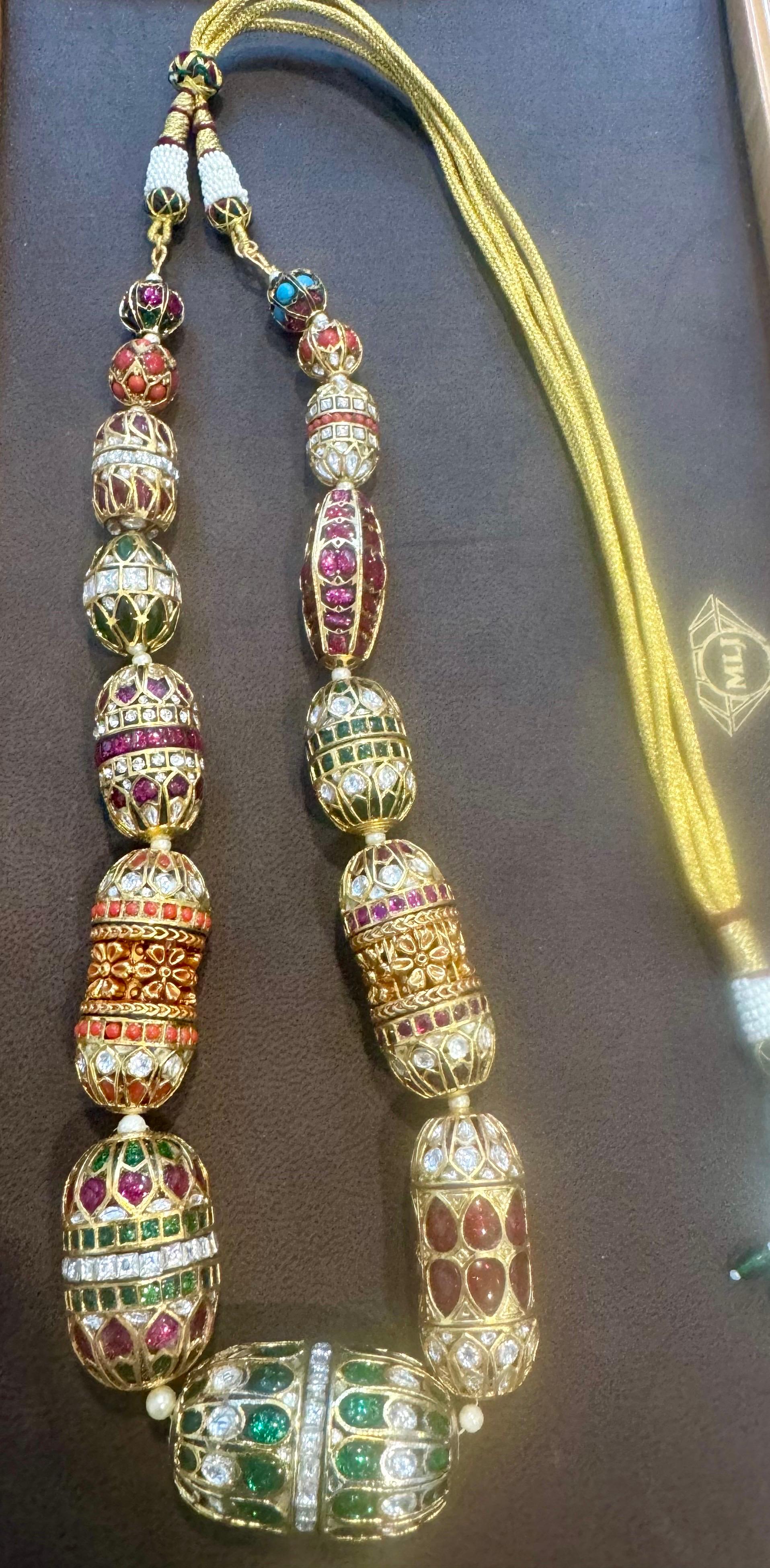 Mughal Magnificenct Traditional Bead & Cabochon Multi Color Vintage Necklace
Jadau Traditional Kundan Synthetic stones in Yellow  Gold  tone, its not gold

Base Metal : metal
Metal Purity : 14 karat yellow gold plated
Gross Weight of the necklace