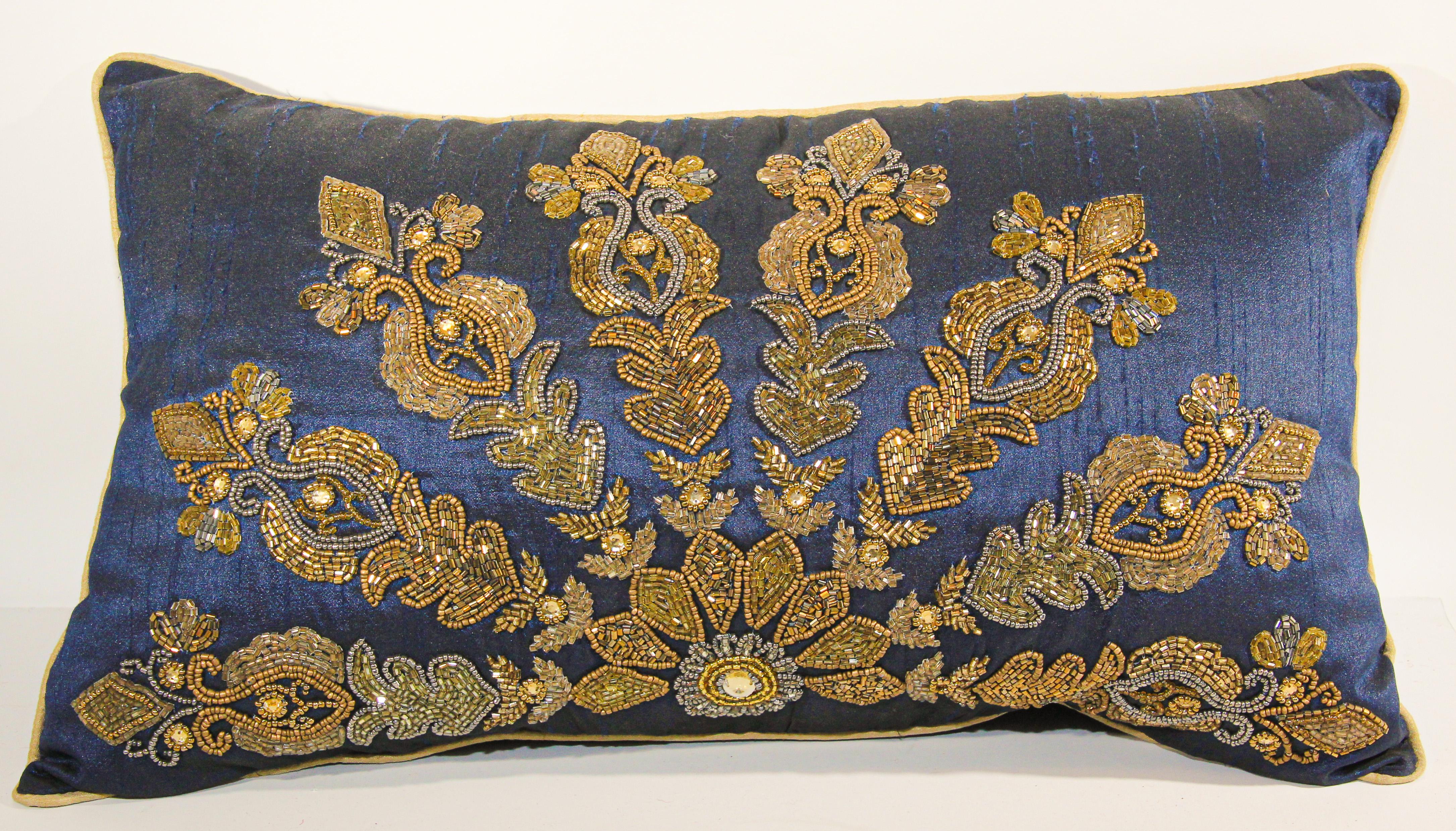Mughal India royal blue Dupioni silk throw pillow embroidered with gold beads in a peacock style design.
Vintage lumbar decorative silk blue throw pillow handcrafted with gold beads and sequins.
Handcrafted luxury throw pillow.
Measures: 10
