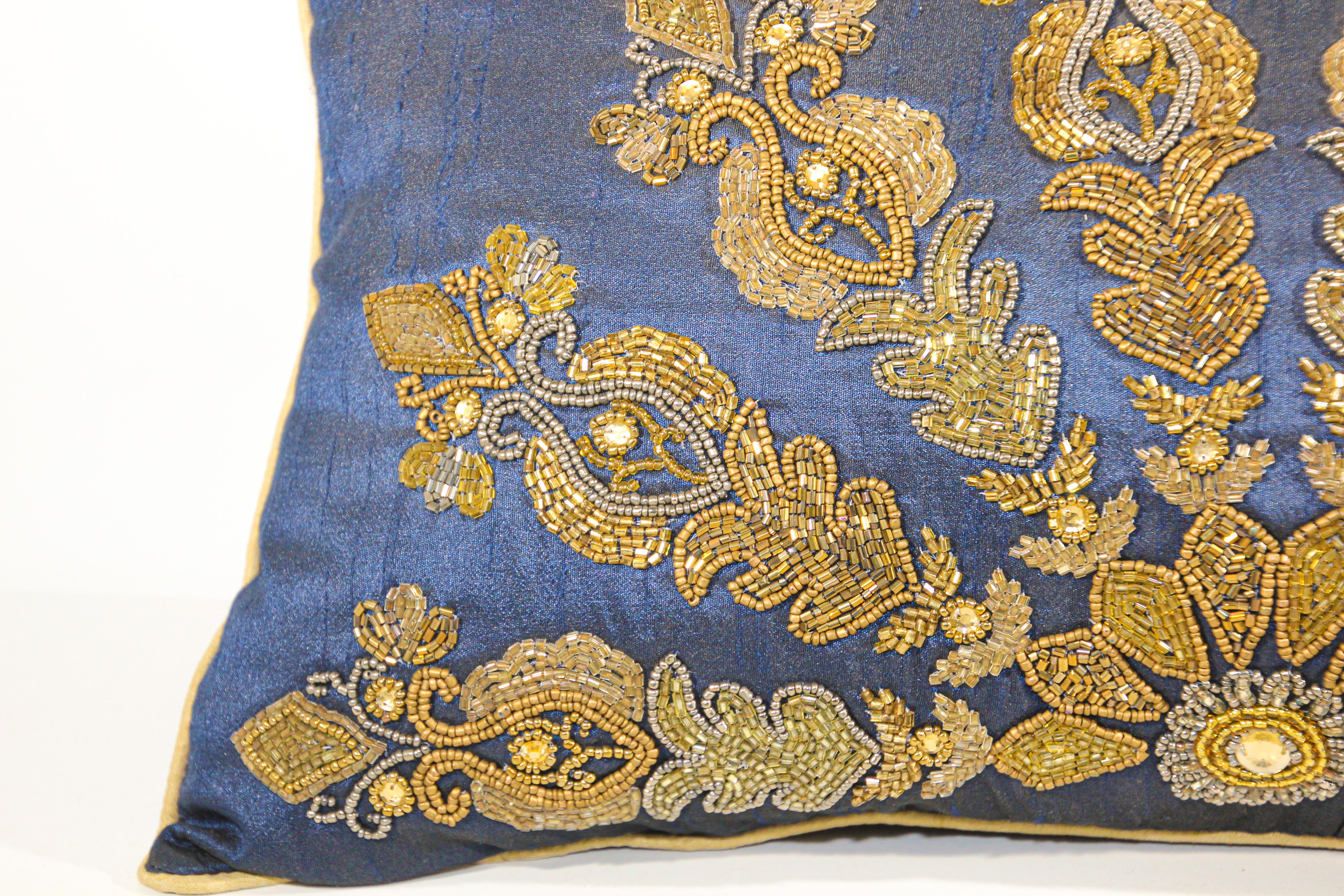 royal blue and gold pillows