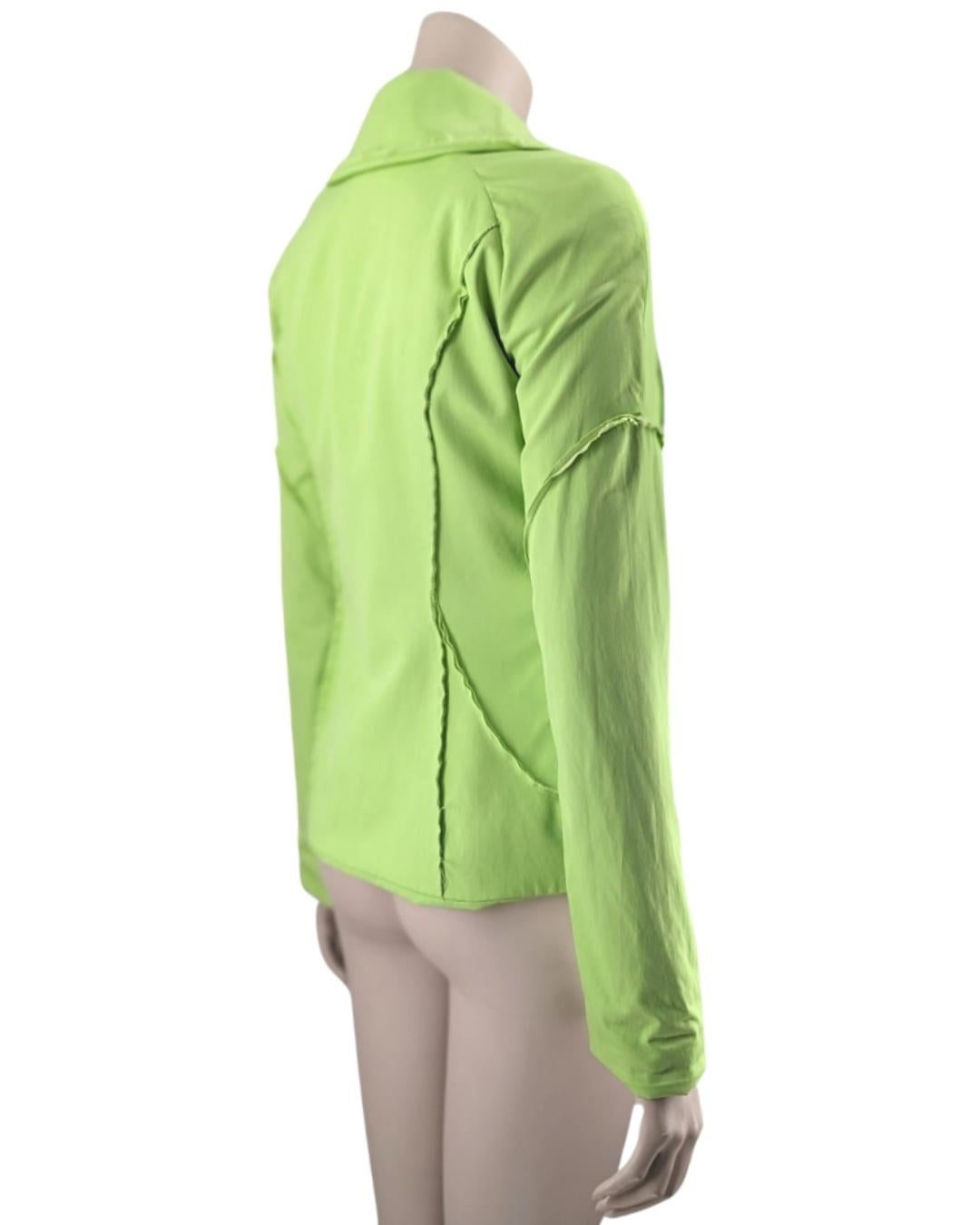 Mugler Acid Green Jacket with lettuce edges.
Circa 1990s.

. Fitted design silhouette
· Deep V-neck
· Lettuce edges

Fits  S, M 
Tag label 38FR

Flat measurements : 

pit to pit : 42 cm
Bust : 40 cm
Length : 62 cm
Sleeves : 62 cm
Waist : 36