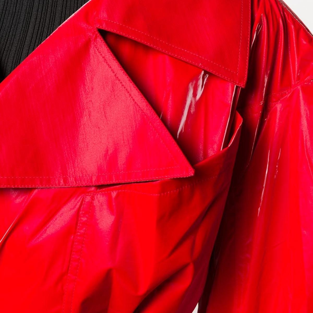red vinyl trench coat