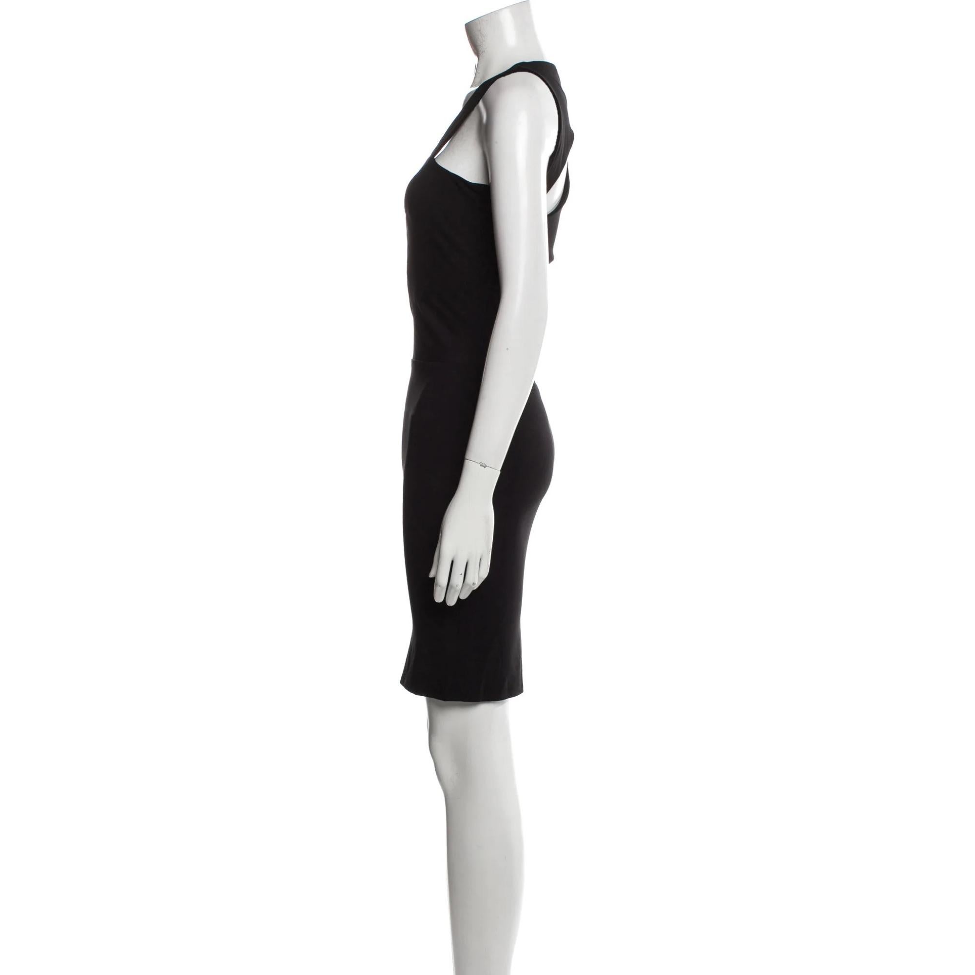 Mugler Dress. Black. Cutout Accent. Concealed Zip Closure at Side.

Color: Black
Material: 78% Viscose, 18% Polyamide, 4% Elastane
Condition: Very good.
Size: S  US4, FR36

Measurements
Bust: 30”
Waist: 22.5”
Hip: 29.5”
Length: 35.75”

Made in Italy