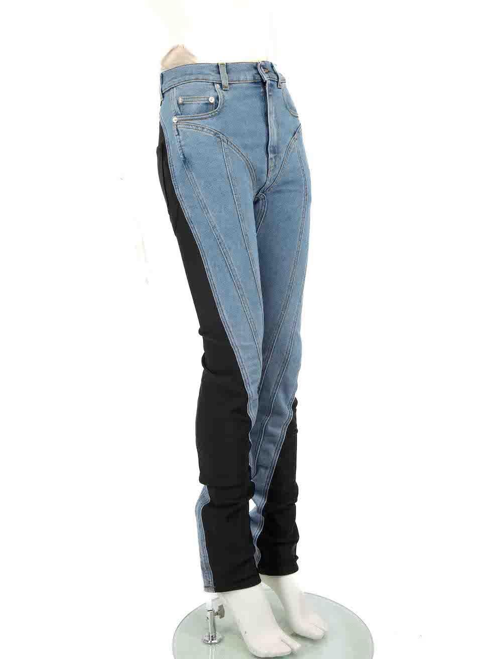 CONDITION is Very good. Minimal wear to denim is evident. Minimal wear to both cuffs with discolouration on this used Mugler designer resale item.
 
 Details
 Blue
 Denim
 Jeans
 Skinny fit
 Stretchy panels
 Spiral detail
 3x Front pockets
 2x Back